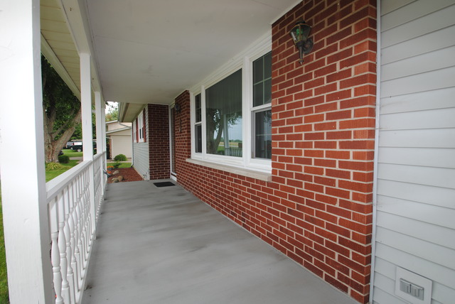 17676 Frazier Road Sandwich, IL 60548 - Photo 3 of 25 a view of a brick house with stairs