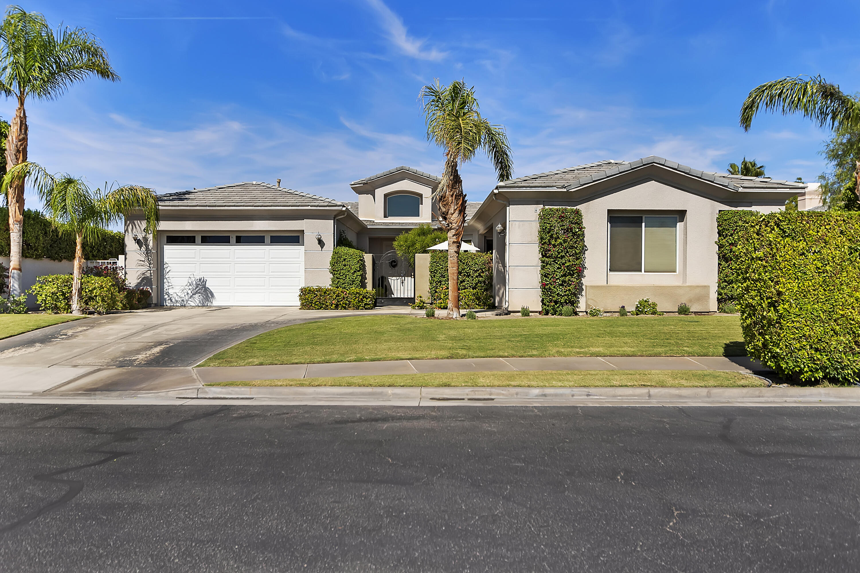 60 Victor Hugo Road Rancho Mirage, CA 92270 - Photo 1 of 44 a view of house with outdoor space and garden