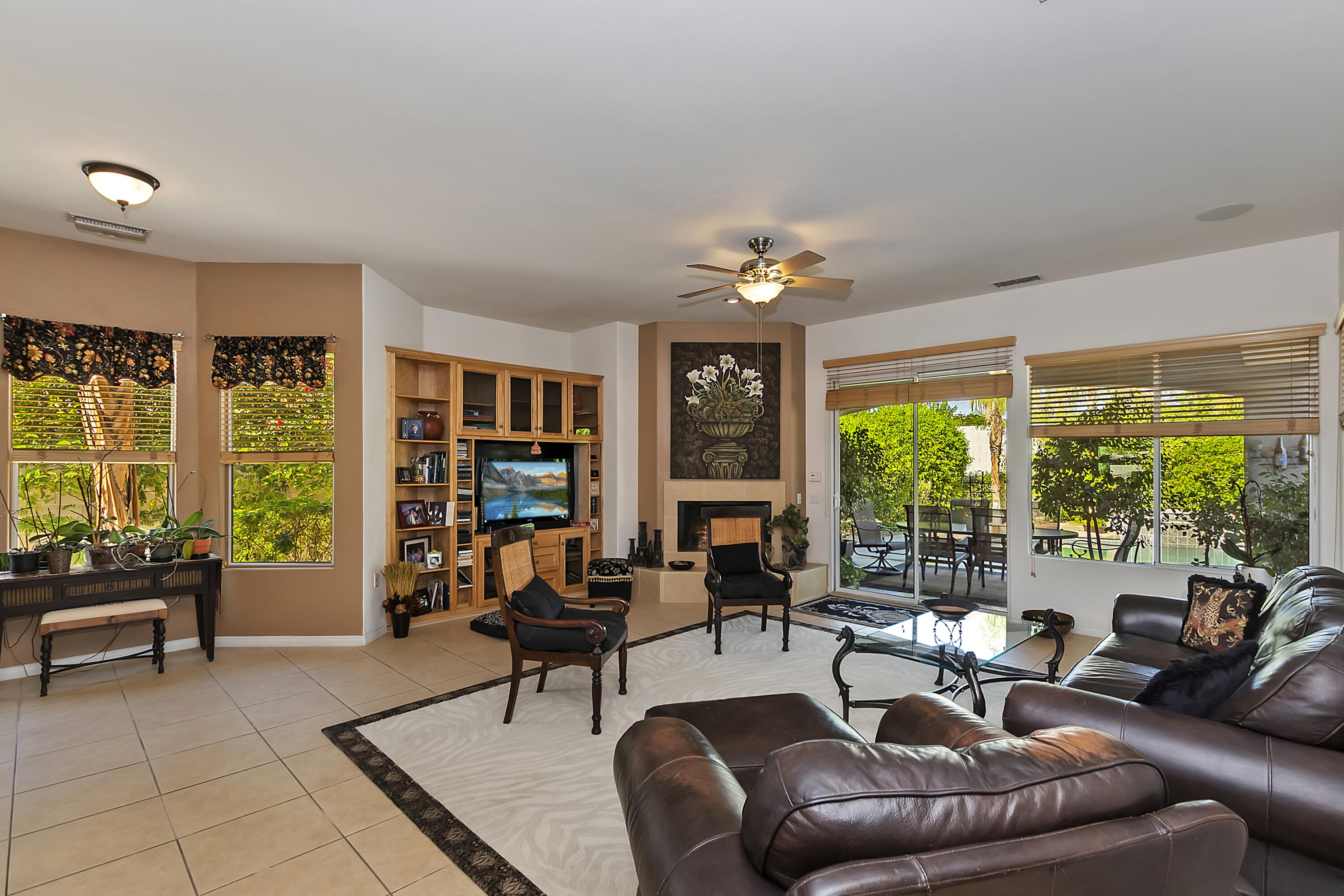 60 Victor Hugo Road Rancho Mirage, CA 92270 - Photo 14 of 44 a living room with furniture and large windows