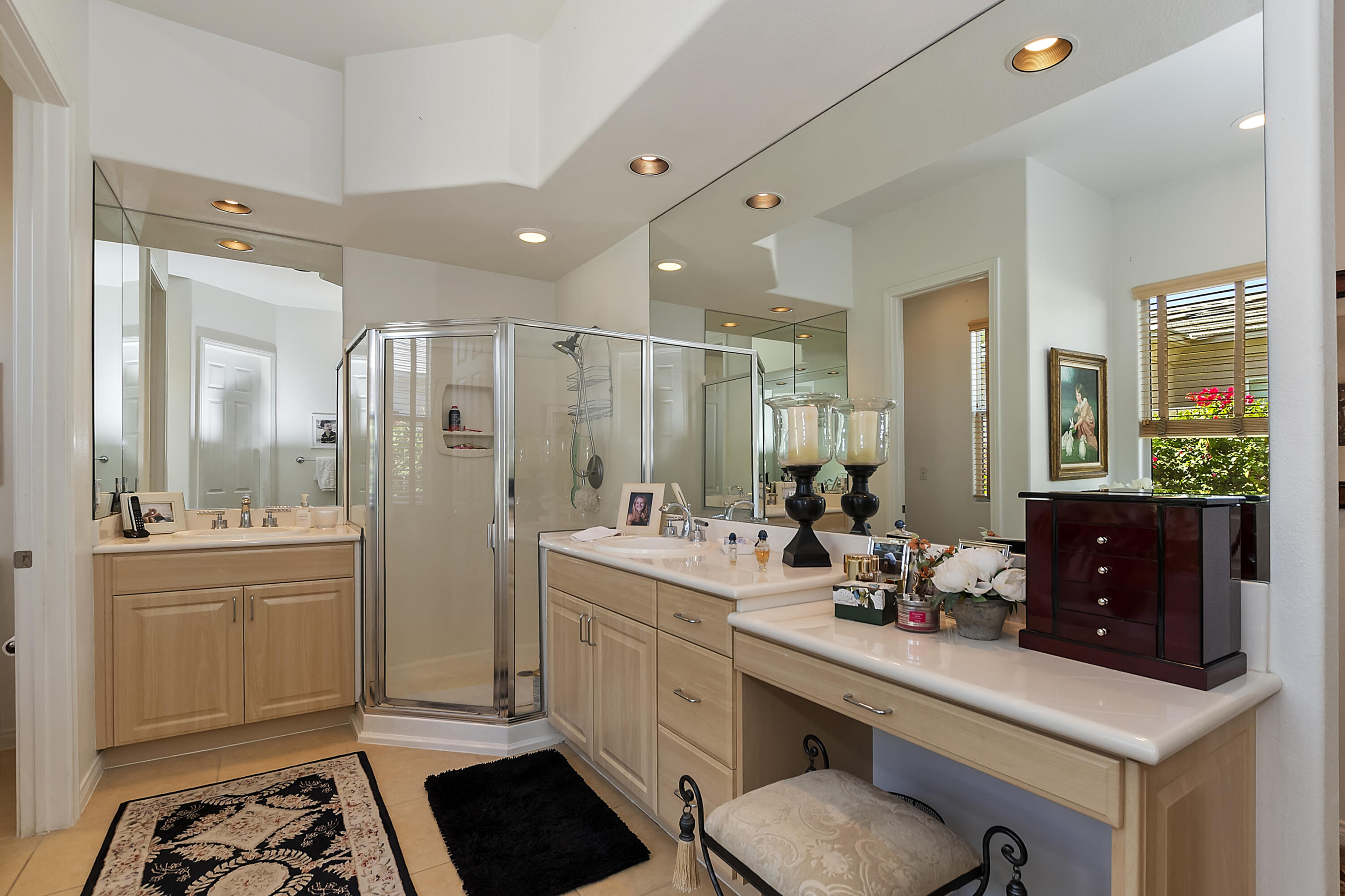 60 Victor Hugo Road Rancho Mirage, CA 92270 - Photo 28 of 44 a bathroom with a sink double vanity granite and a mirror