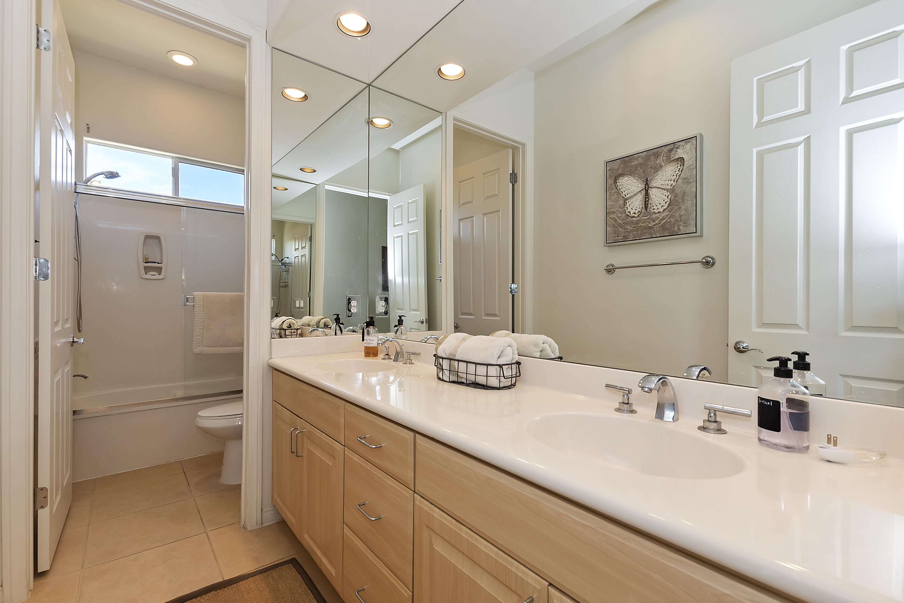 60 Victor Hugo Road Rancho Mirage, CA 92270 - Photo 32 of 44 a bathroom with a double vanity sink mirror and double