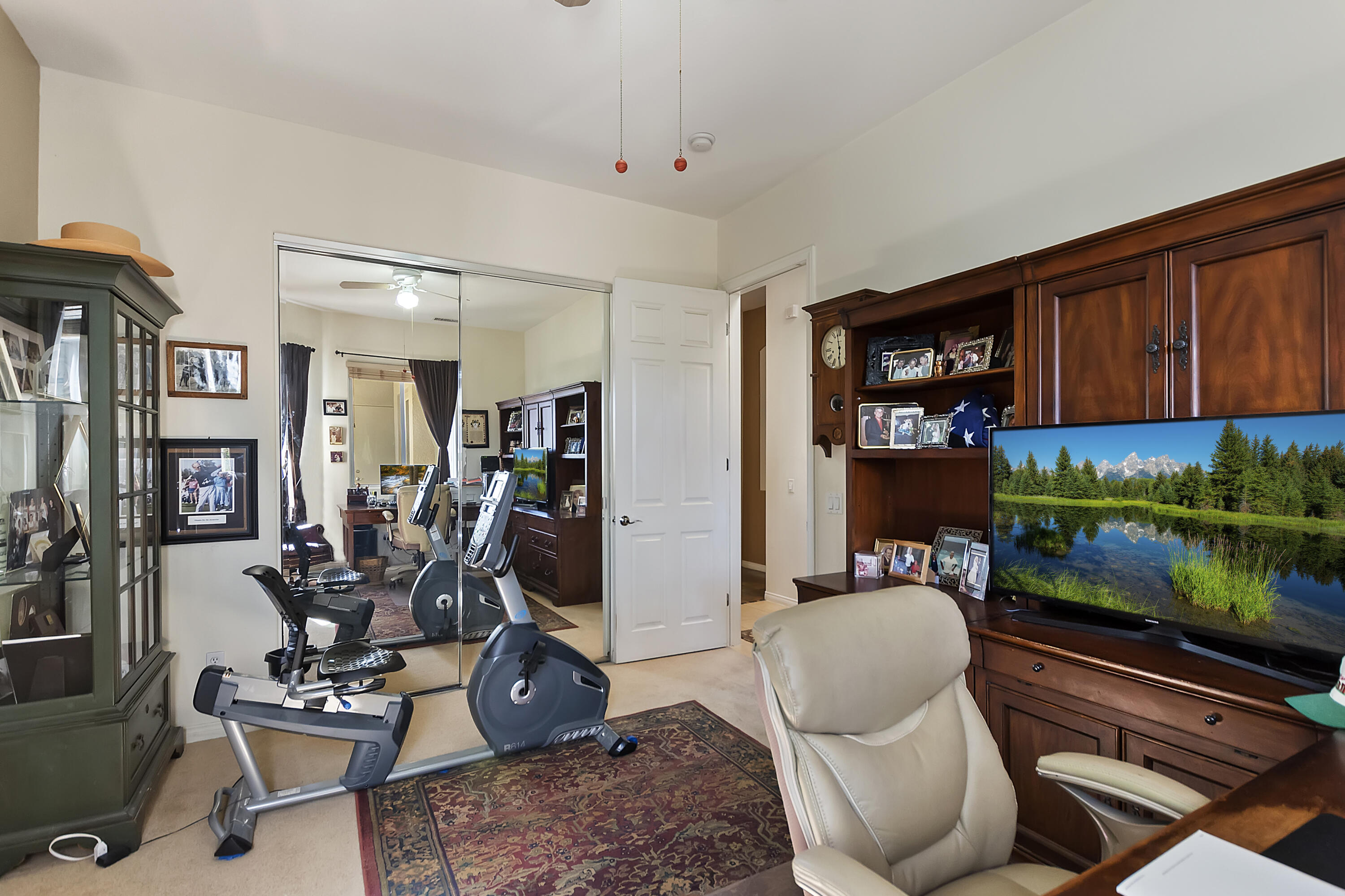 60 Victor Hugo Road Rancho Mirage, CA 92270 - Photo 36 of 44 a room with gym equipment and a table