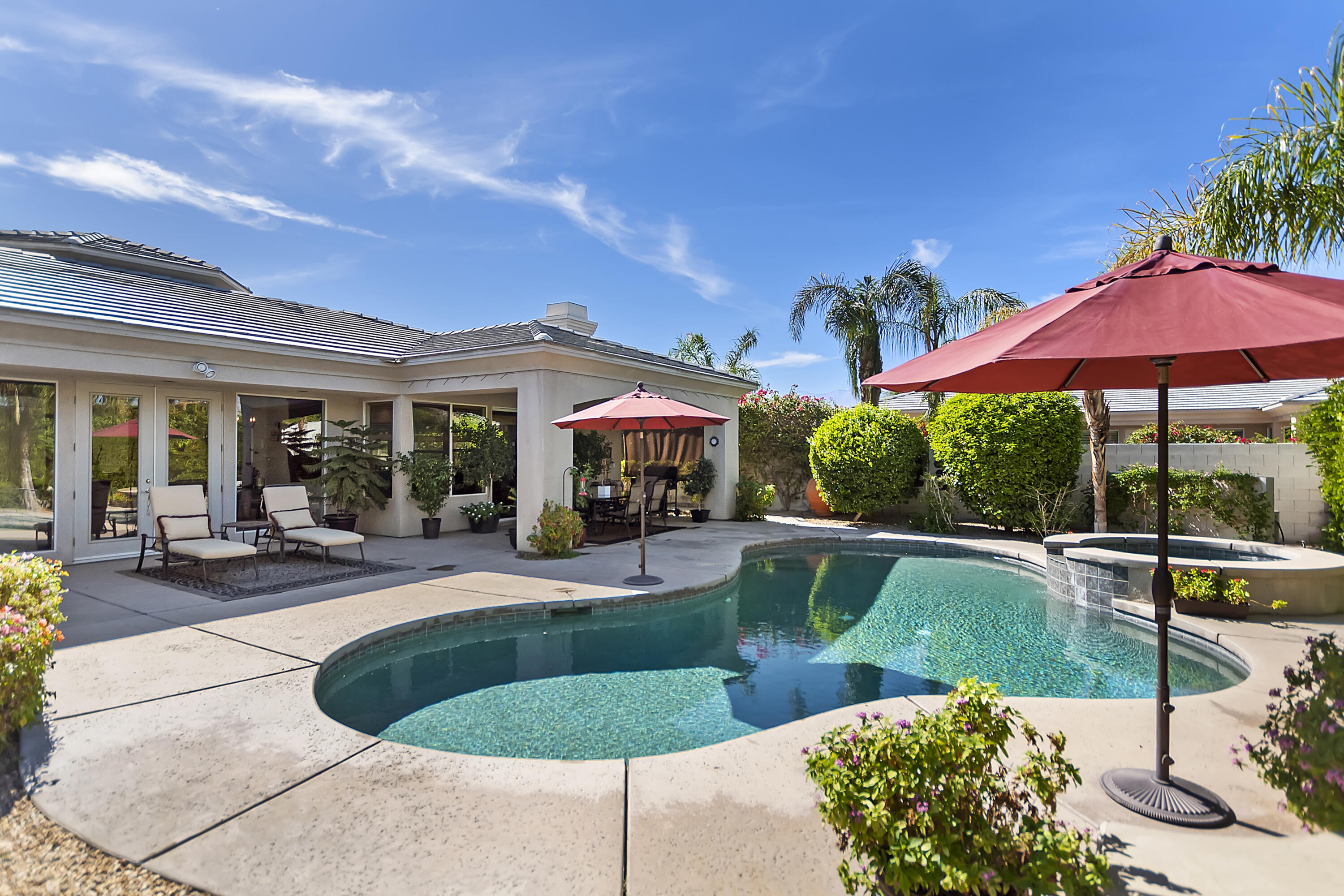 60 Victor Hugo Road Rancho Mirage, CA 92270 - Photo 39 of 44 a view of house with outdoor space and swimming pool