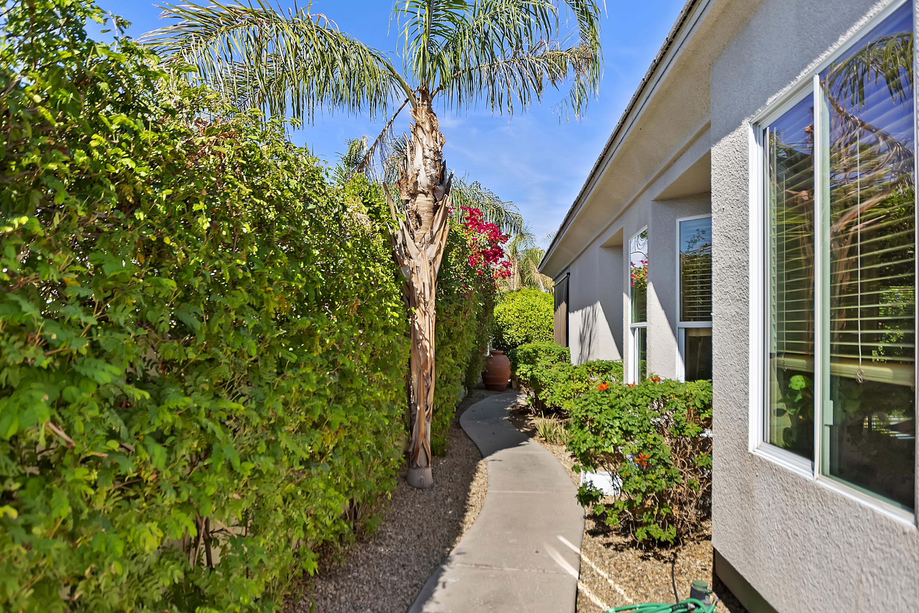 60 Victor Hugo Road Rancho Mirage, CA 92270 - Photo 44 of 44 a view of a house with a backyard
