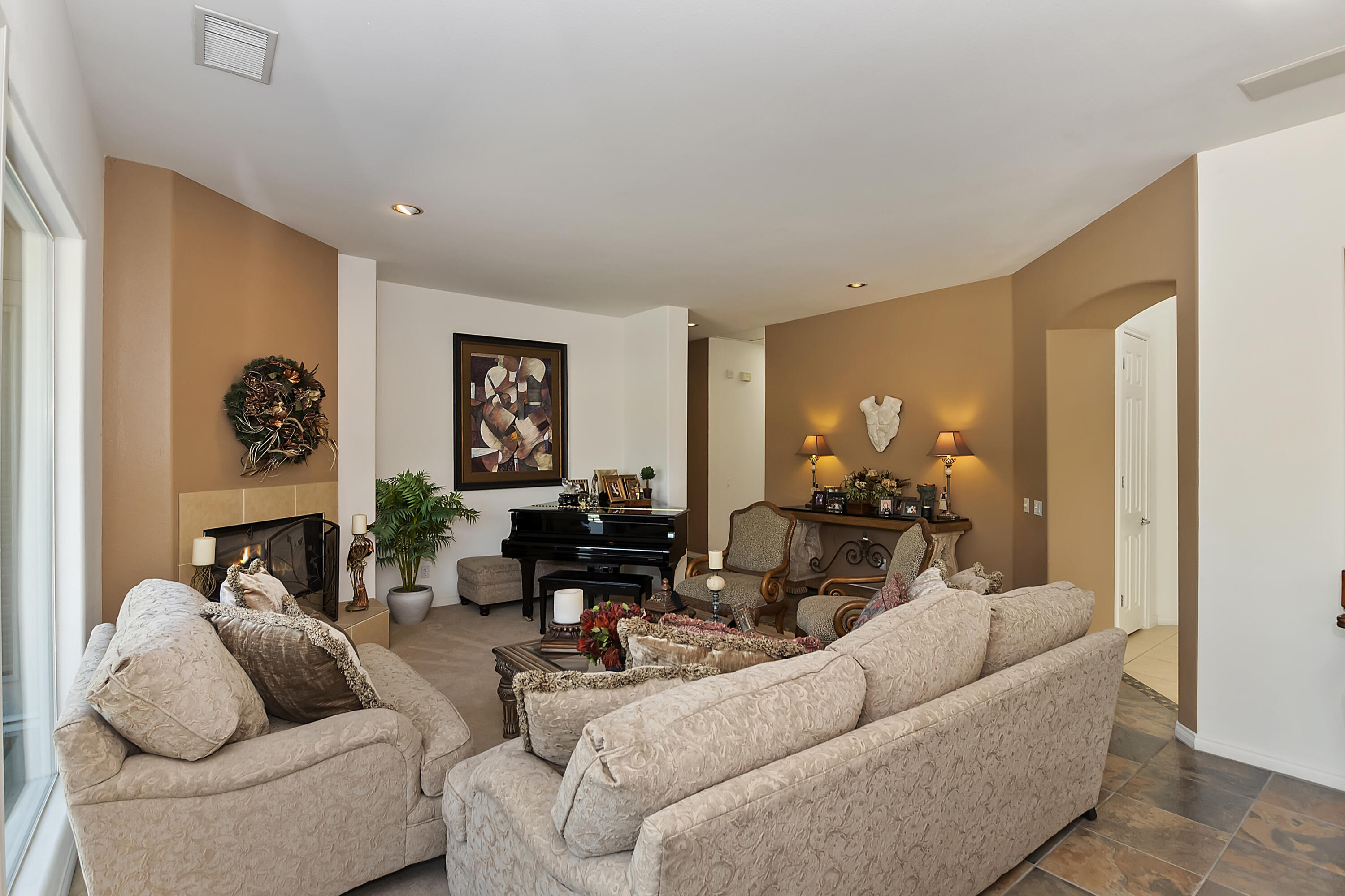 60 Victor Hugo Road Rancho Mirage, CA 92270 - Photo 9 of 44 a living room with furniture and a couch