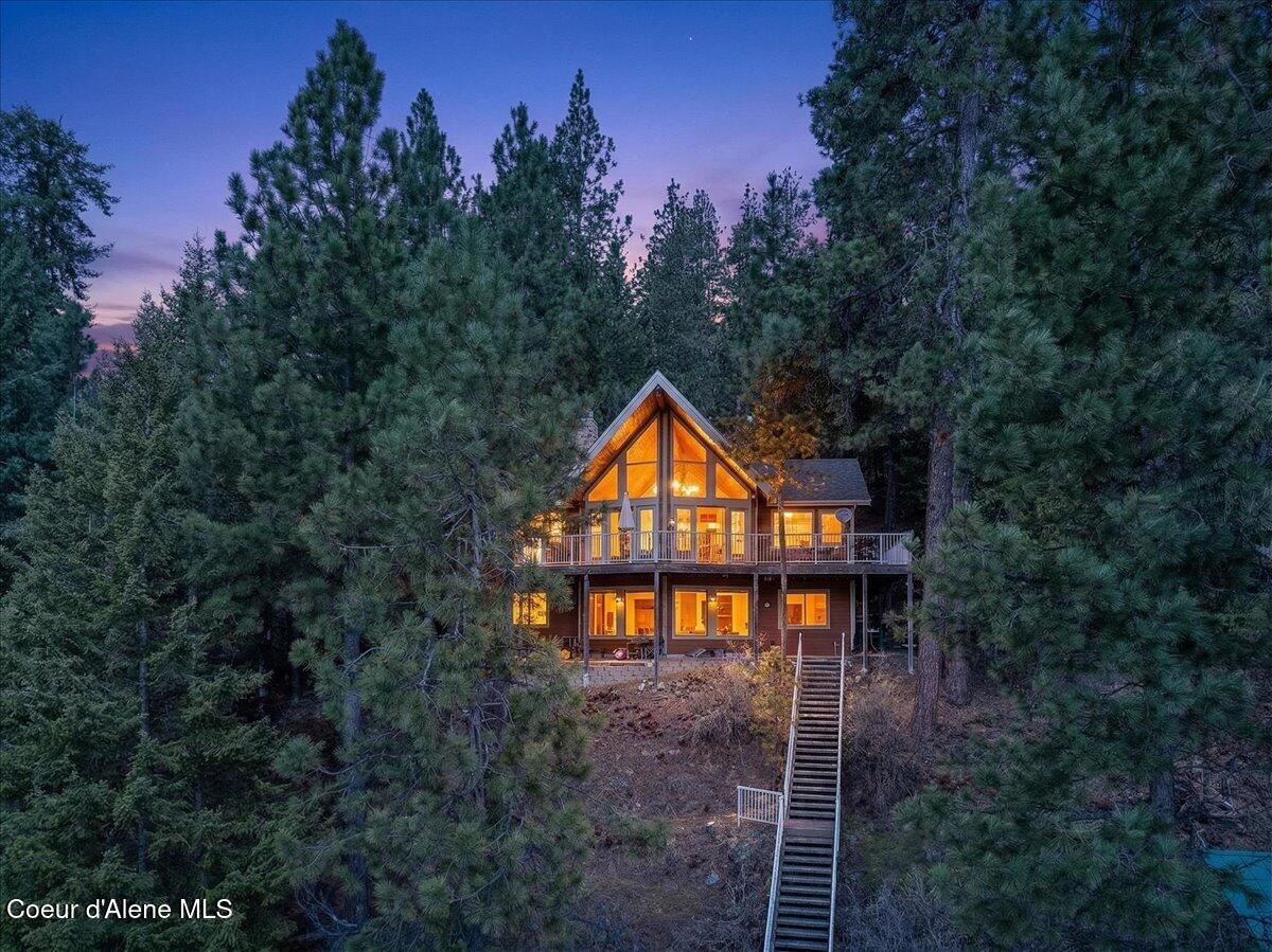 6832 West Half Cir Loop Worley, ID 83876 - Photo 2 of 68 02-Twilight Aerial Back of Home