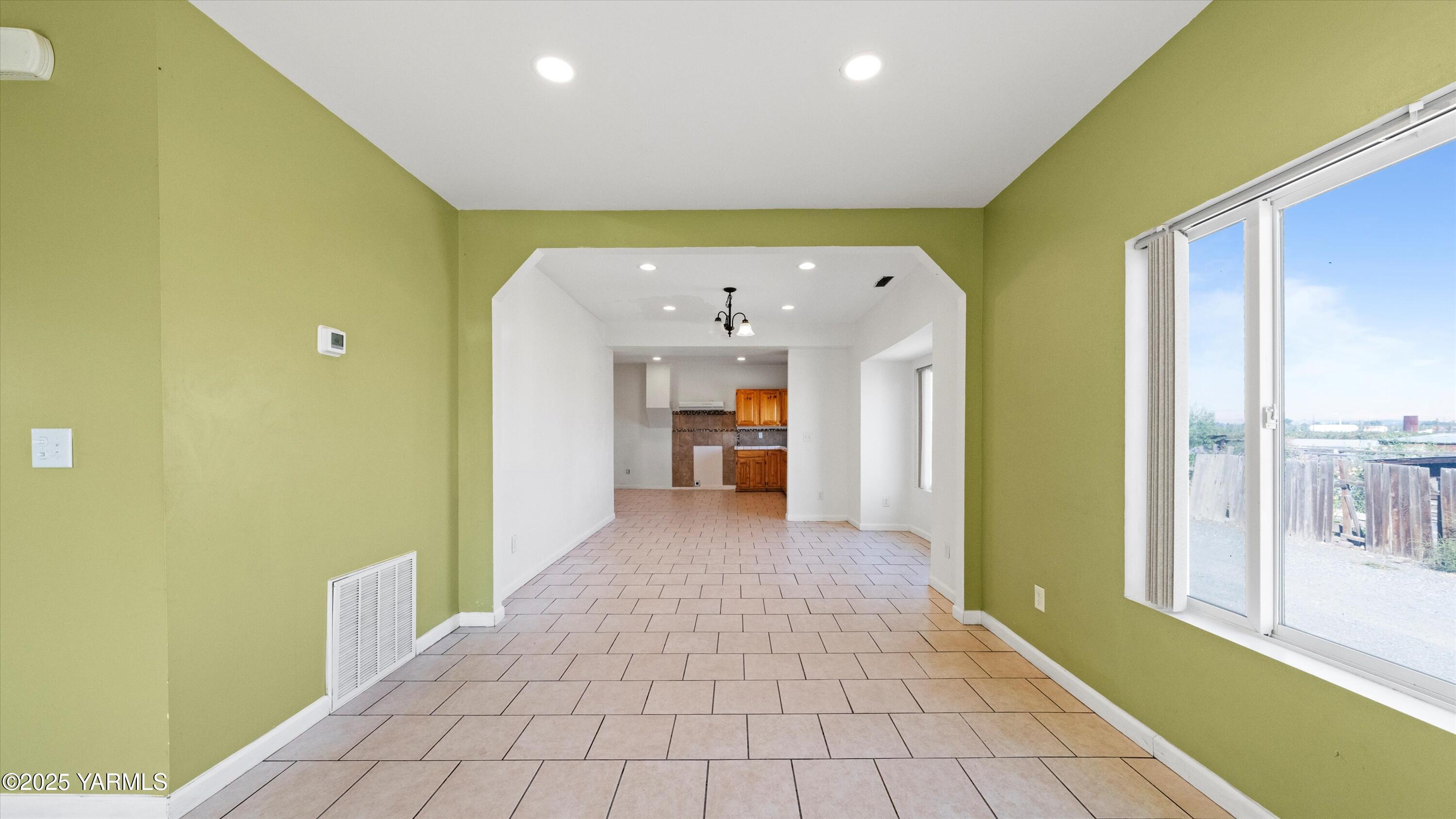 1423 Progressive Road Wapato, WA 98951 - Photo 14 of 24 a view of a hallway with a livingroom and a bathroom