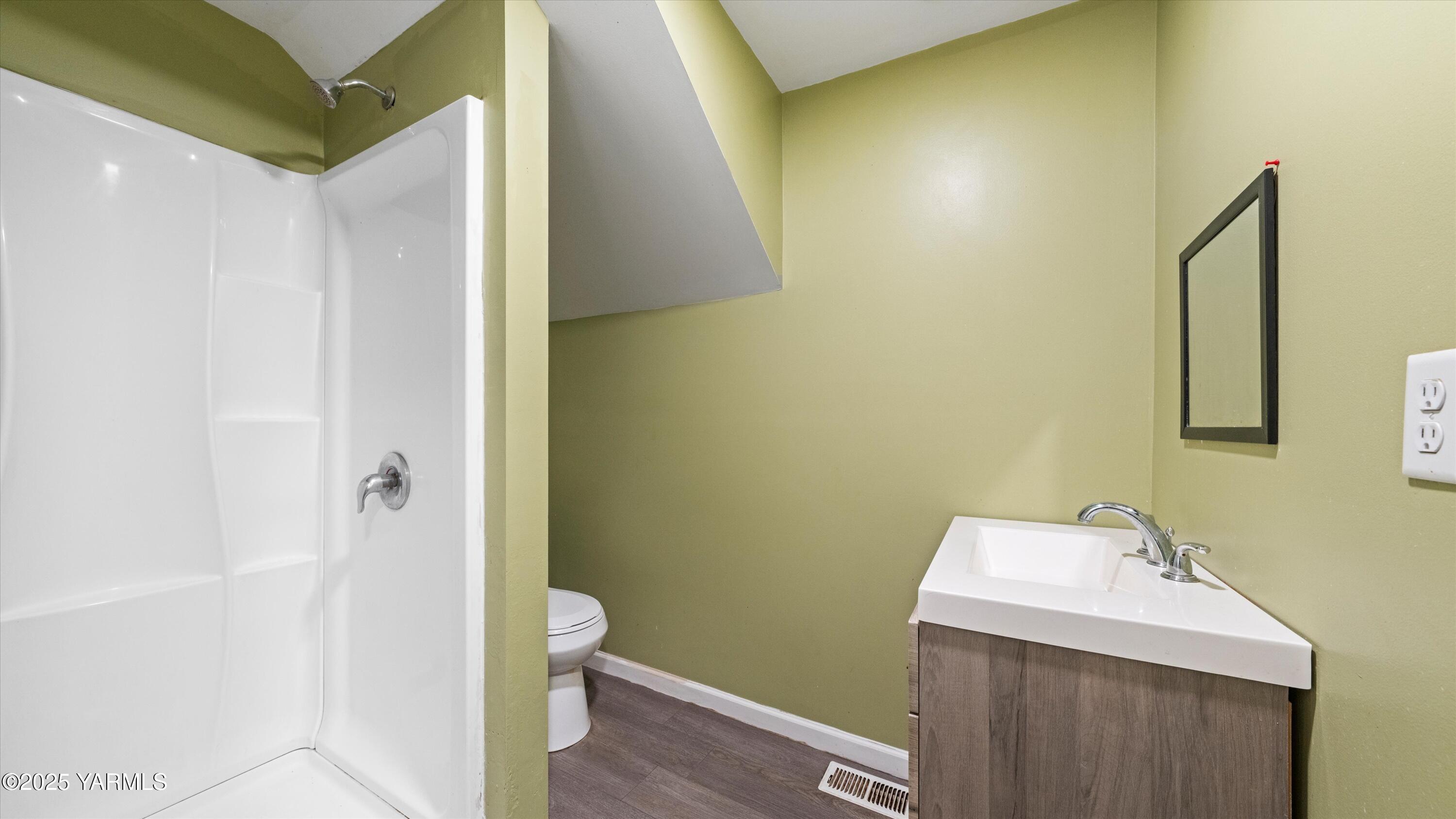 1423 Progressive Road Wapato, WA 98951 - Photo 17 of 24 a bathroom with a sink toilet and shower