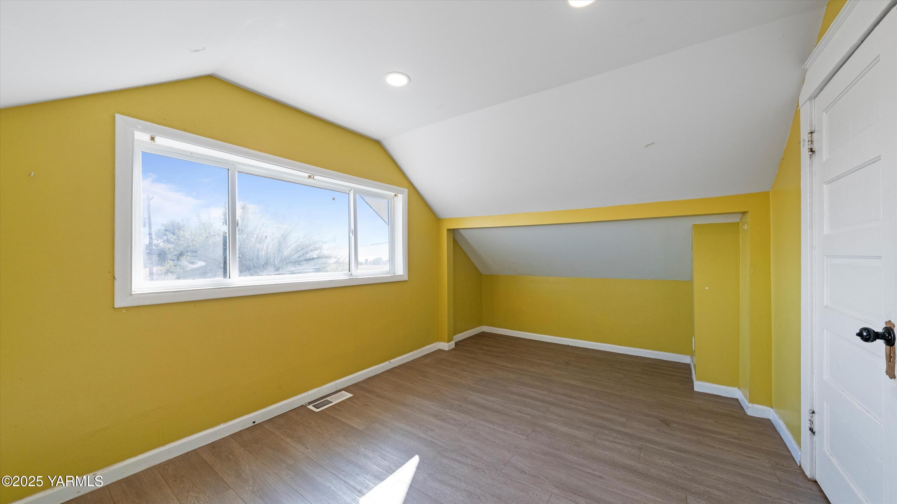 1423 Progressive Road Wapato, WA 98951 - Photo 19 of 24 a view of empty room with wooden floor