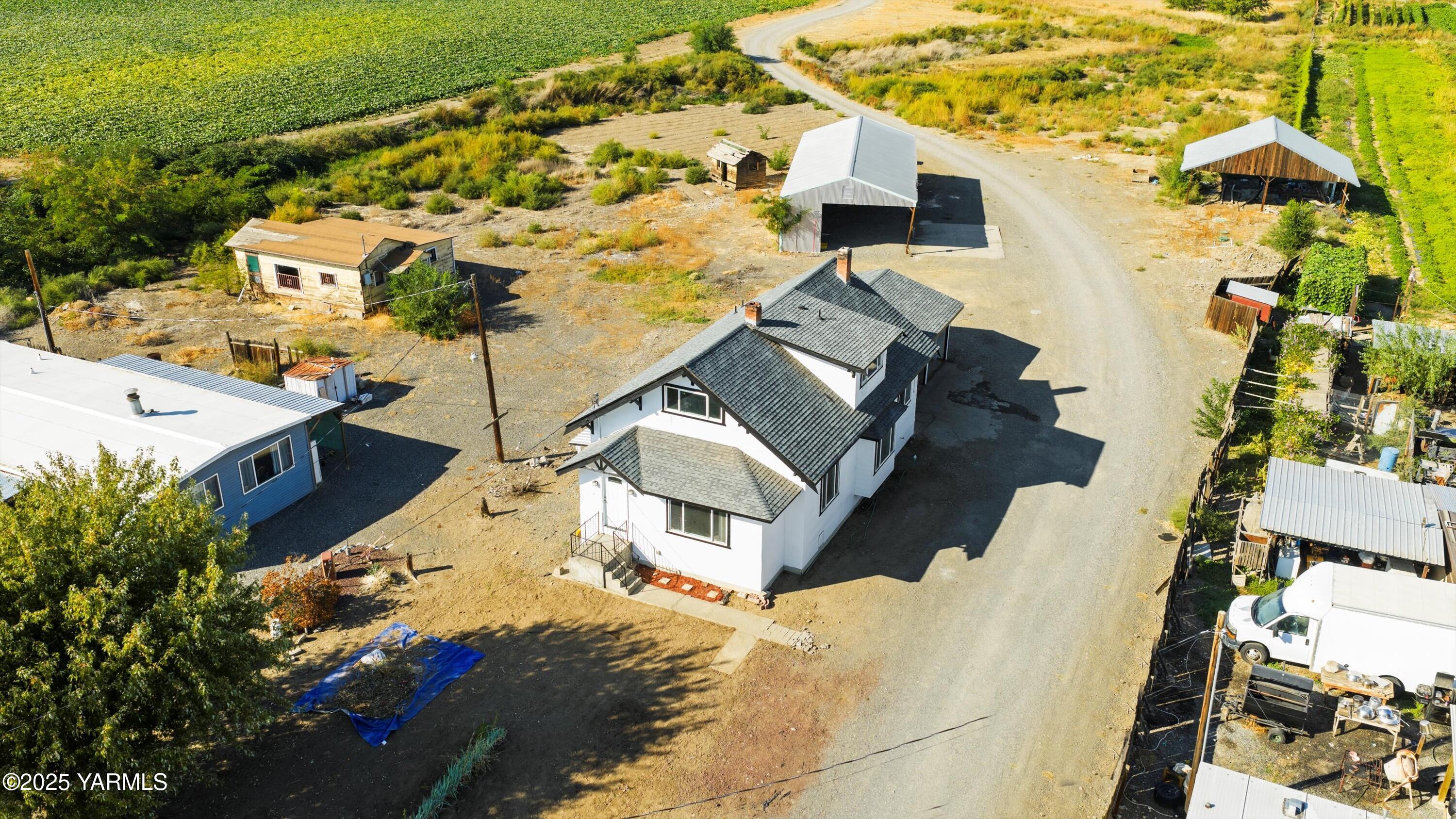 1423 Progressive Road Wapato, WA 98951 - Photo 19 of 24 an aerial view of a house with a backyard