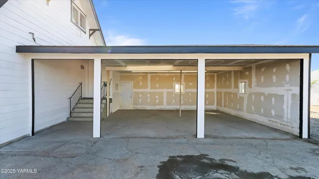 a front view of a house with a garage