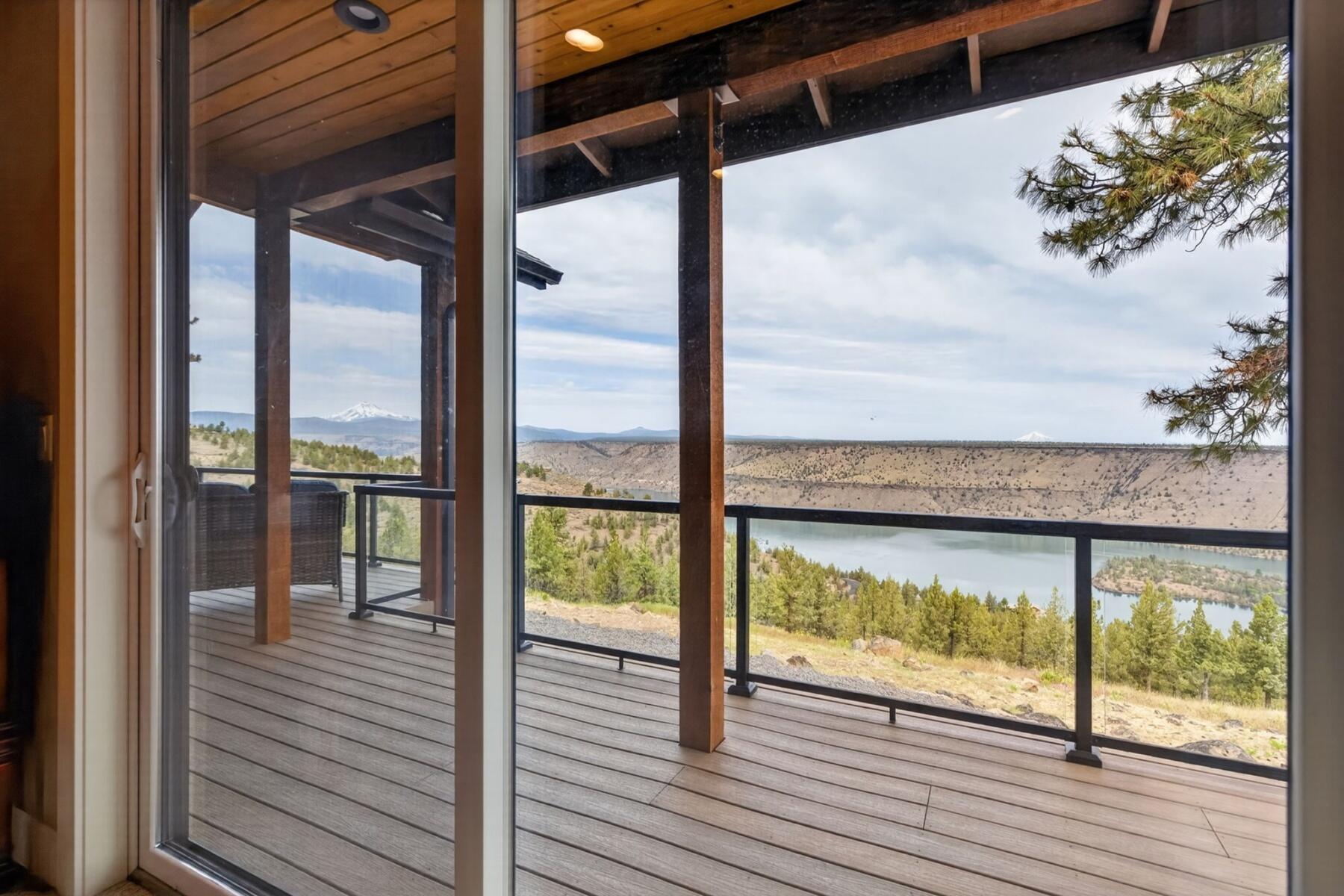 11620 Southwest Pixie Lane Culver, OR 97734 - Photo 8 of 53 a view of a glass door with a balcony