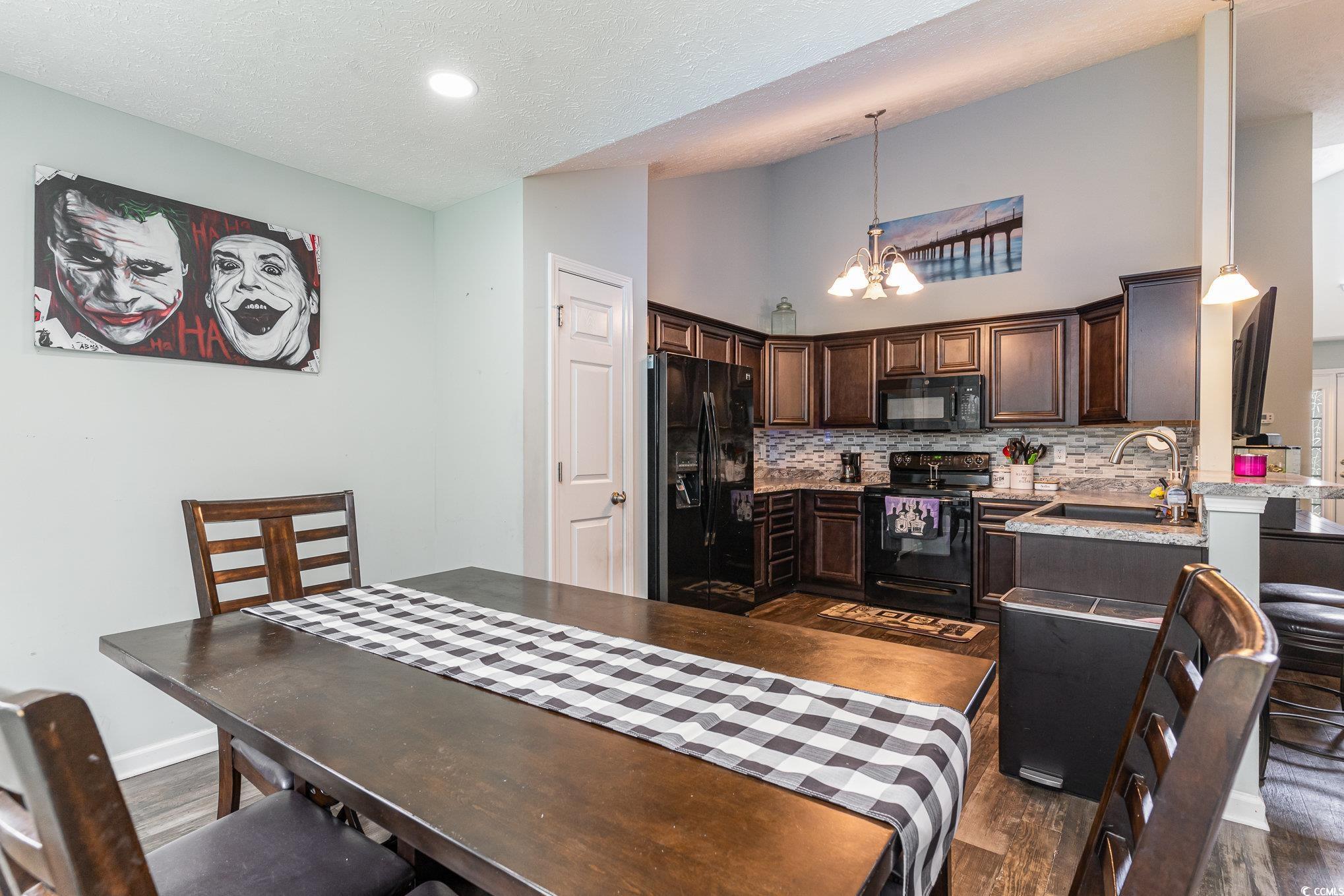 2432 Summerhaven Loop Conway, SC 29527 - Photo 13 of 40 Interior space with pendant lighting, a notable ch
