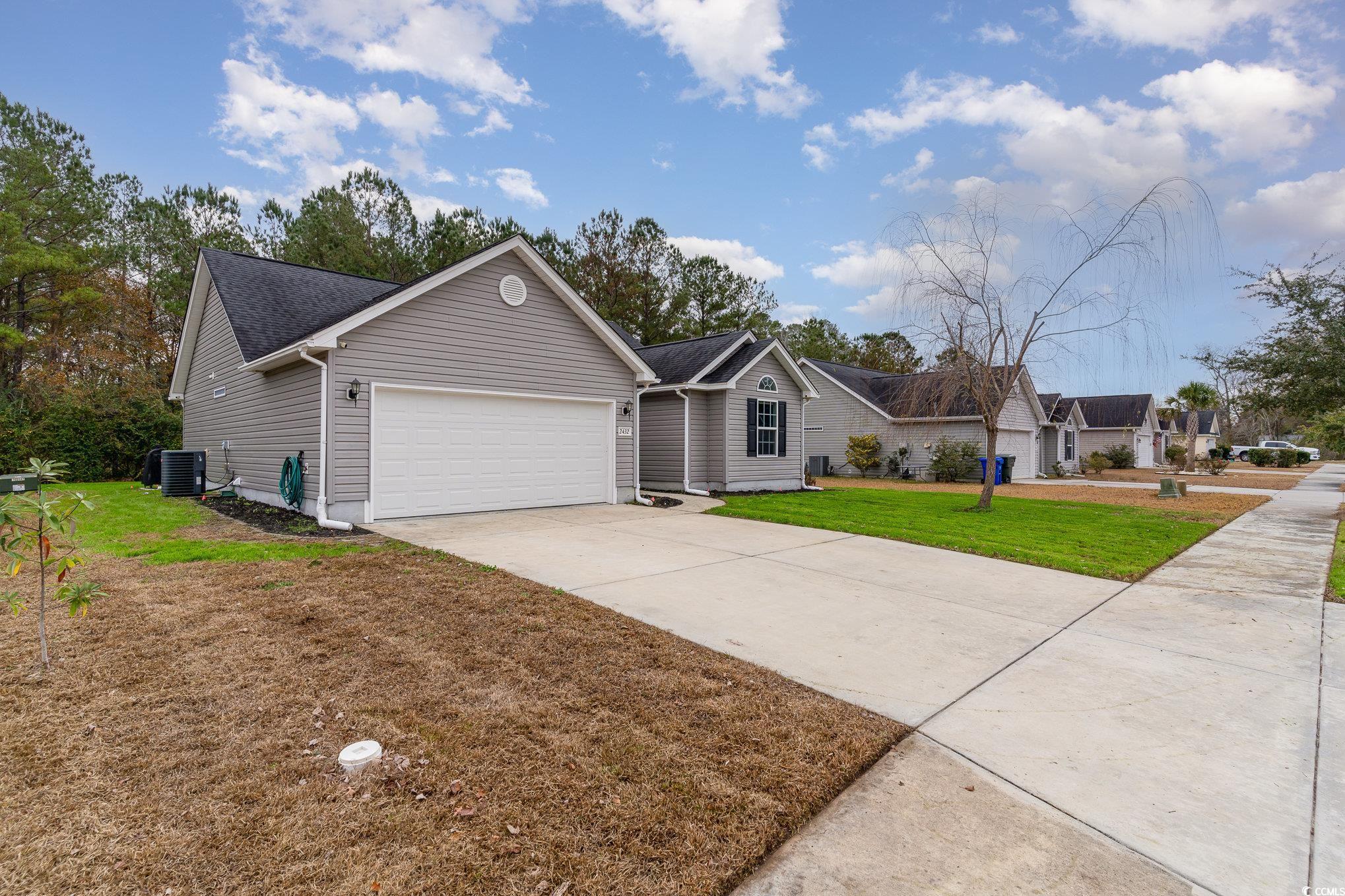 2432 Summerhaven Loop Conway, SC 29527 - Photo 2 of 40 Single story home featuring central AC, a front ya