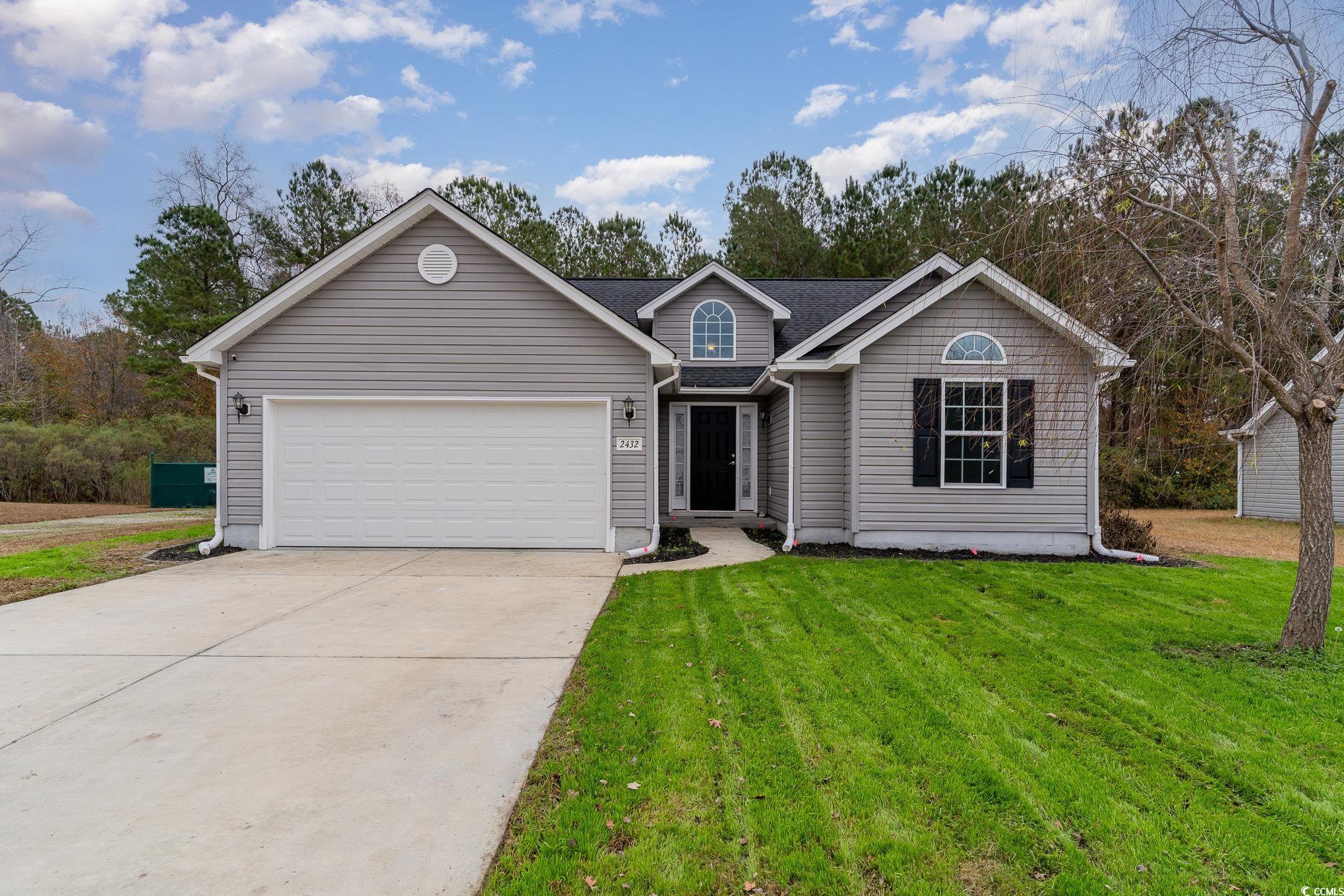2432 Summerhaven Loop Conway, SC 29527 - Photo 4 of 40 View of front of home with a garage and a front la