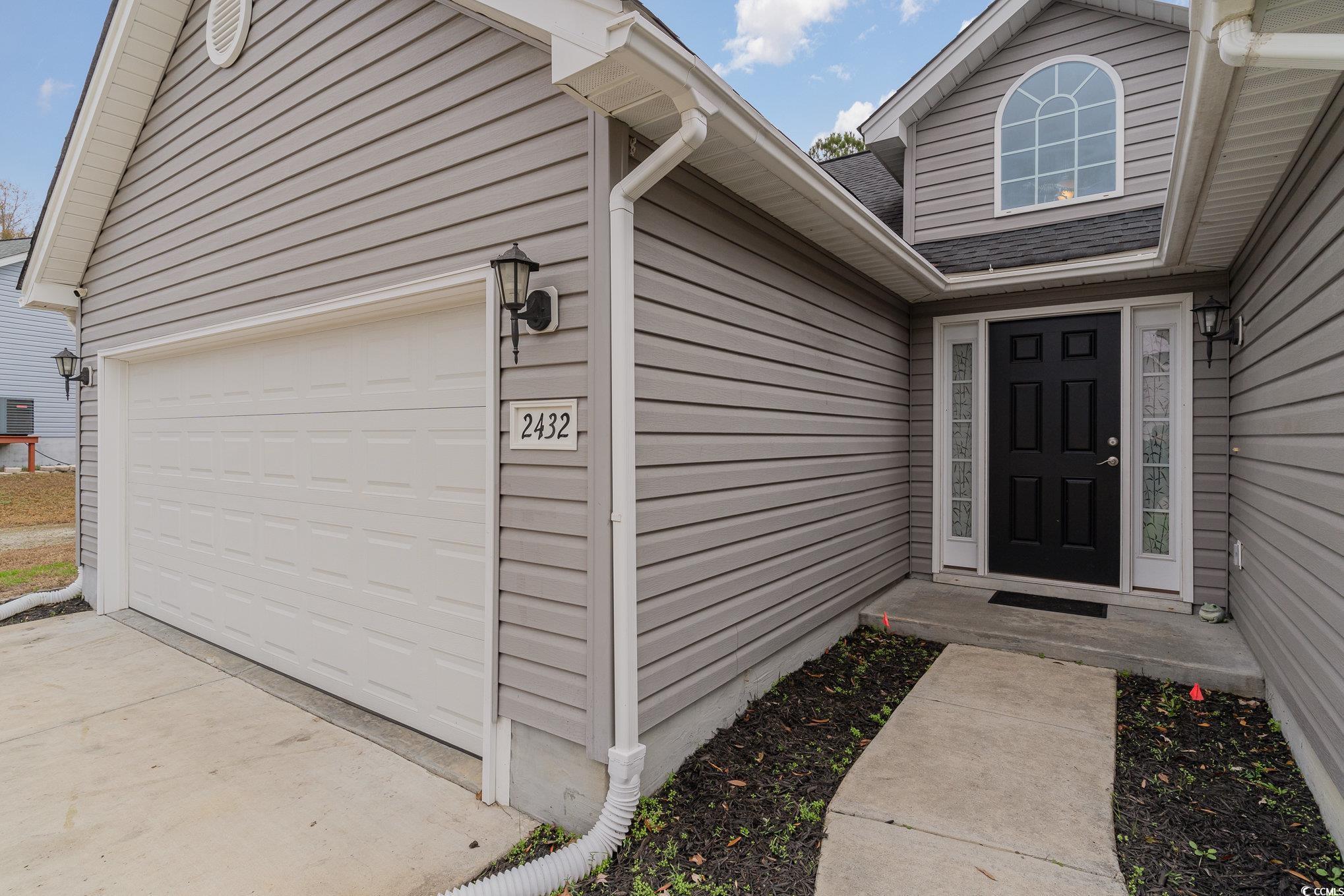2432 Summerhaven Loop Conway, SC 29527 - Photo 5 of 40 Entrance to property featuring a garage