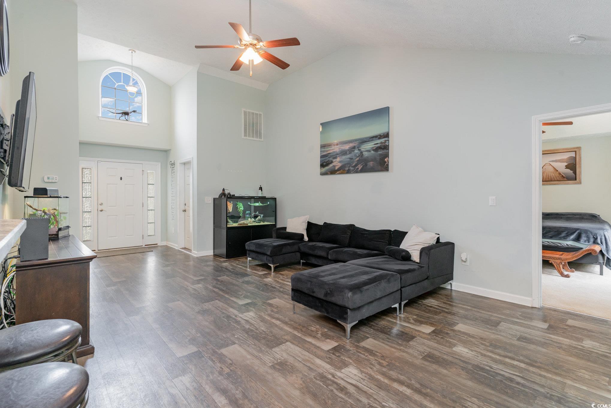 2432 Summerhaven Loop Conway, SC 29527 - Photo 10 of 40 Living room featuring ceiling fan, high vaulted ce