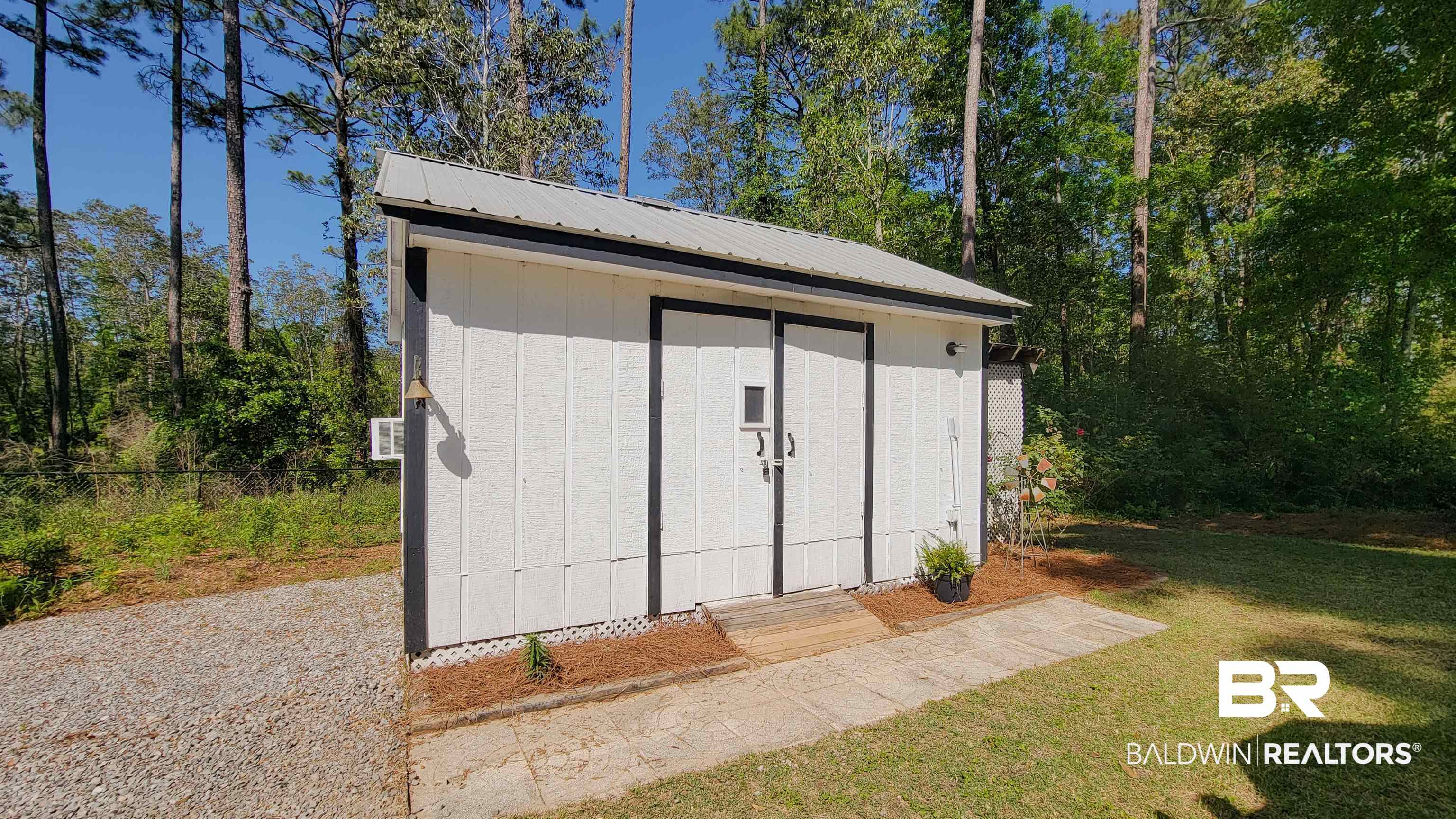 9902 Clarke Ridge Road Foley, AL 36535 - Photo 55 of 61 View of shed with fence