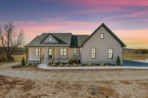 a front view of house with yard