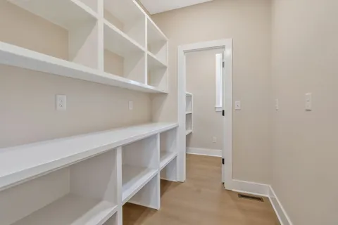 a view of an empty walk in closet