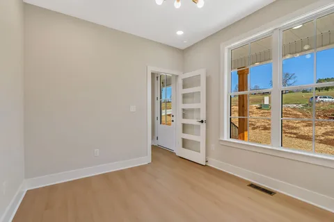 an empty room with windows