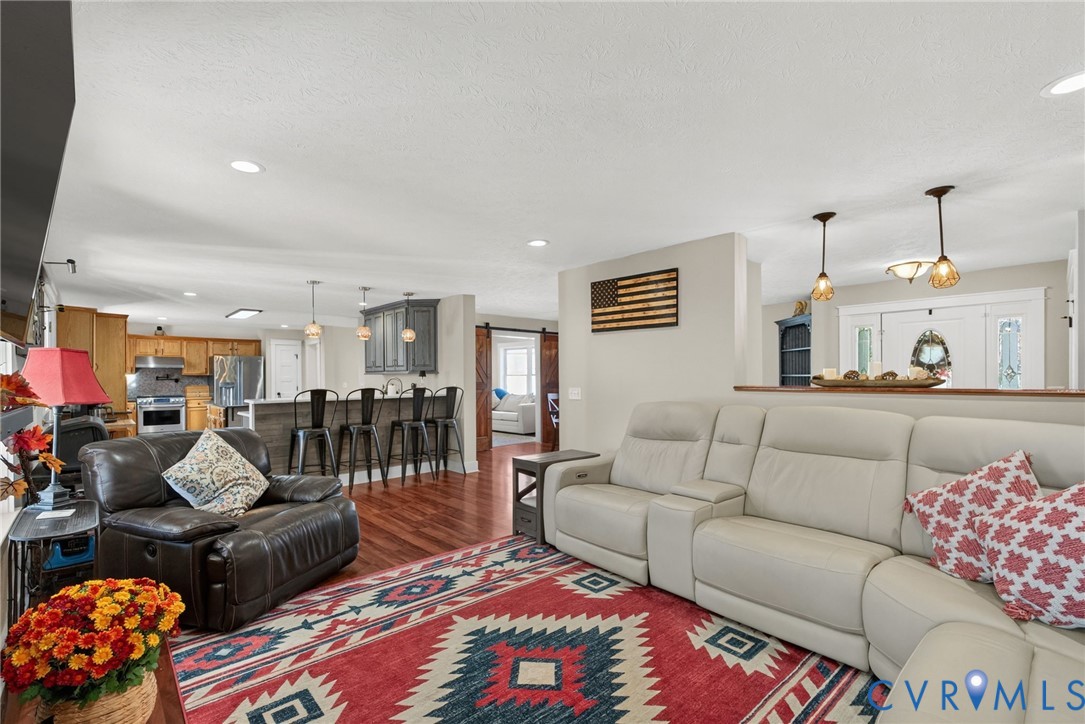 7844 Olivet Church Road New Kent, VA 23124 - Photo 26 of 43 a living room with furniture and a couch