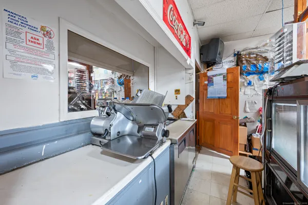 a kitchen with stainless steel appliances granite countertop a stove and cabinets