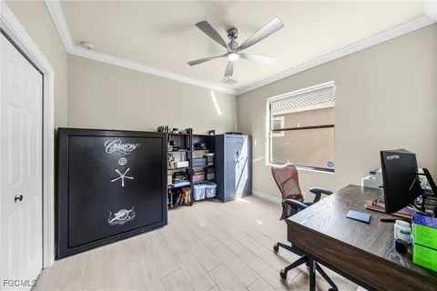 a workspace with furniture and window