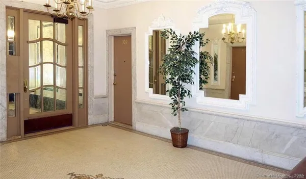 a bathroom with a tub and shower