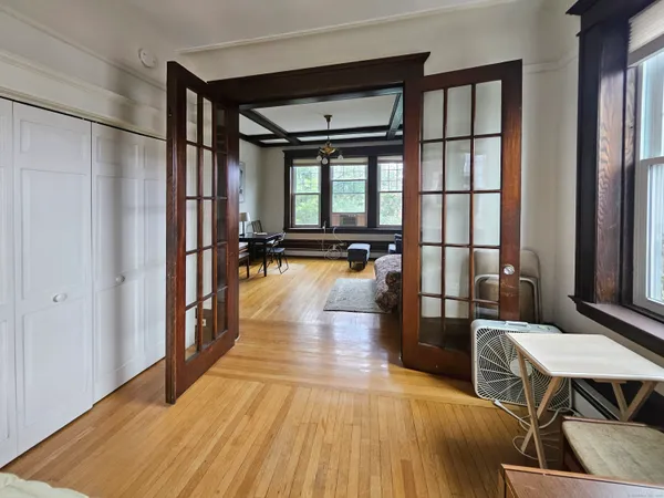 a view of a entryway with furniture and floor to ceiling window