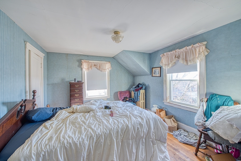 3 Crescent Road Needham, MA 02494 - Photo 12 of 15 a bedroom with a bed and a window