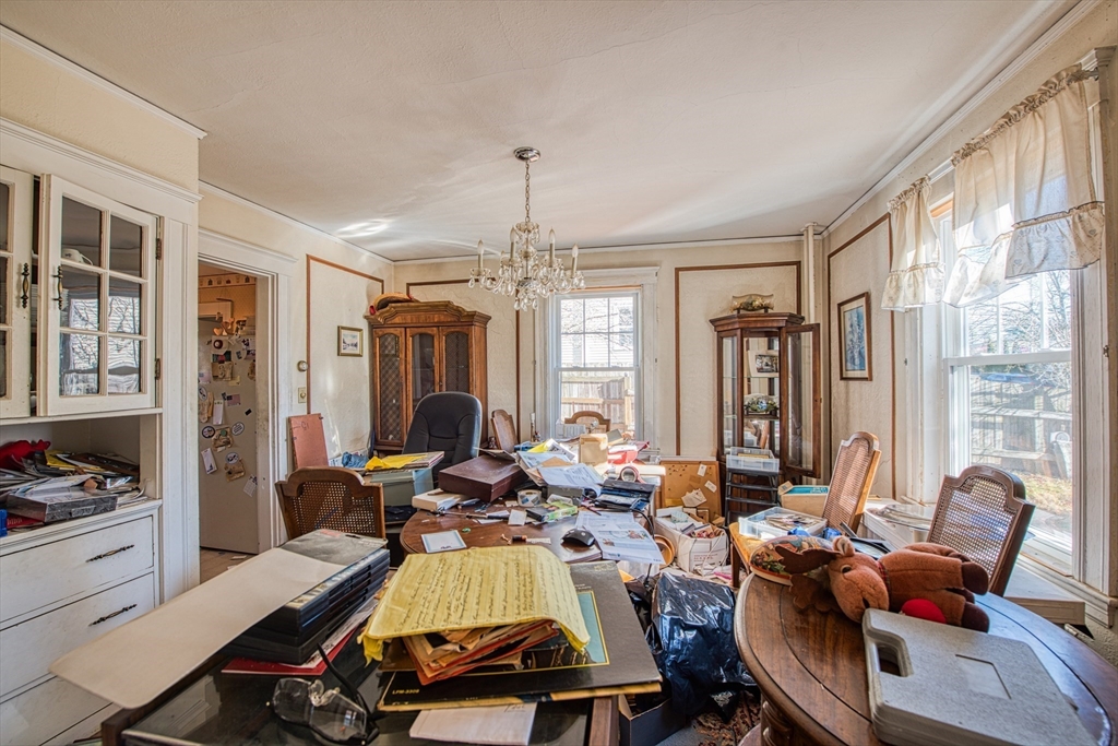 3 Crescent Road Needham, MA 02494 - Photo 8 of 15 a view of a livingroom with workspace and a window