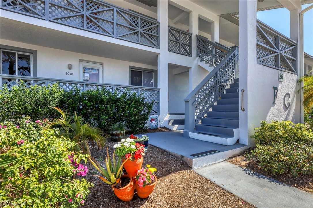 6800 Placida Road, Unit 2002 Englewood, FL 34224 - Photo 1 of 25 front view of a house with a yard