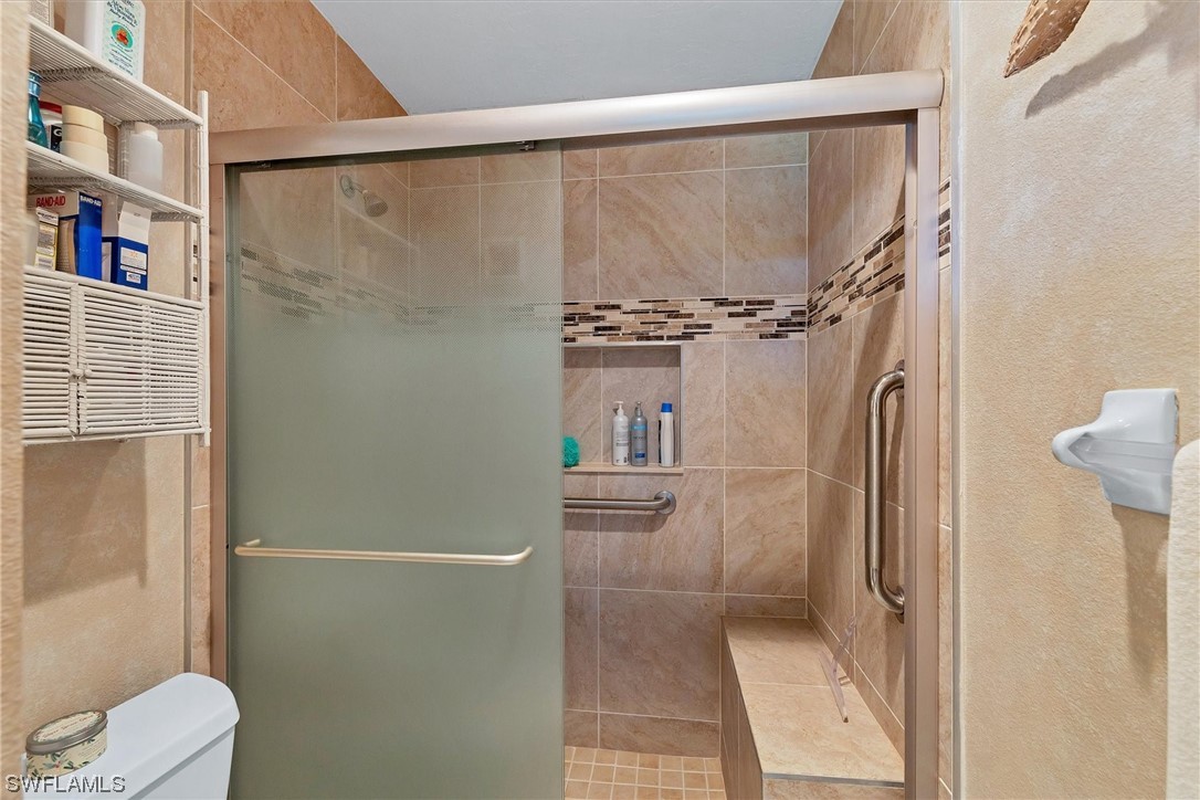 6800 Placida Road, Unit 2002 Englewood, FL 34224 - Photo 20 of 25 a bathroom with a shower