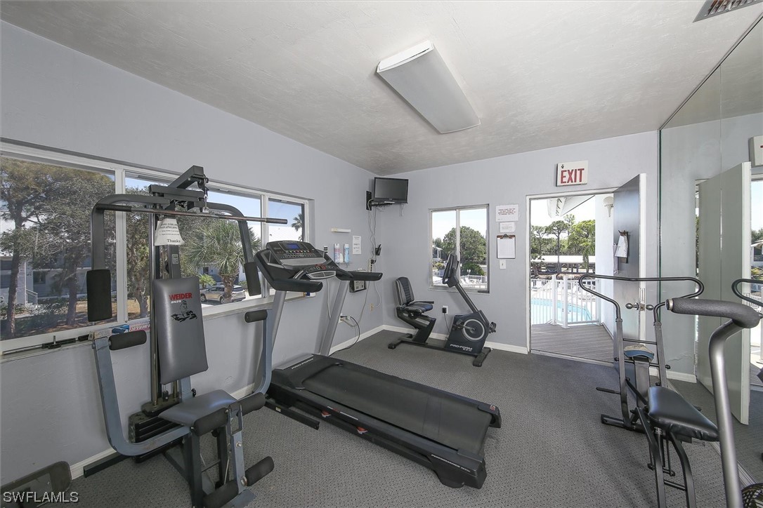 6800 Placida Road, Unit 2002 Englewood, FL 34224 - Photo 23 of 25 a view of a room with gym equipment