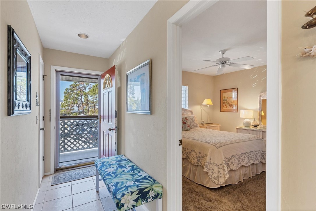6800 Placida Road, Unit 2002 Englewood, FL 34224 - Photo 5 of 25 a bedroom with a bed and a window