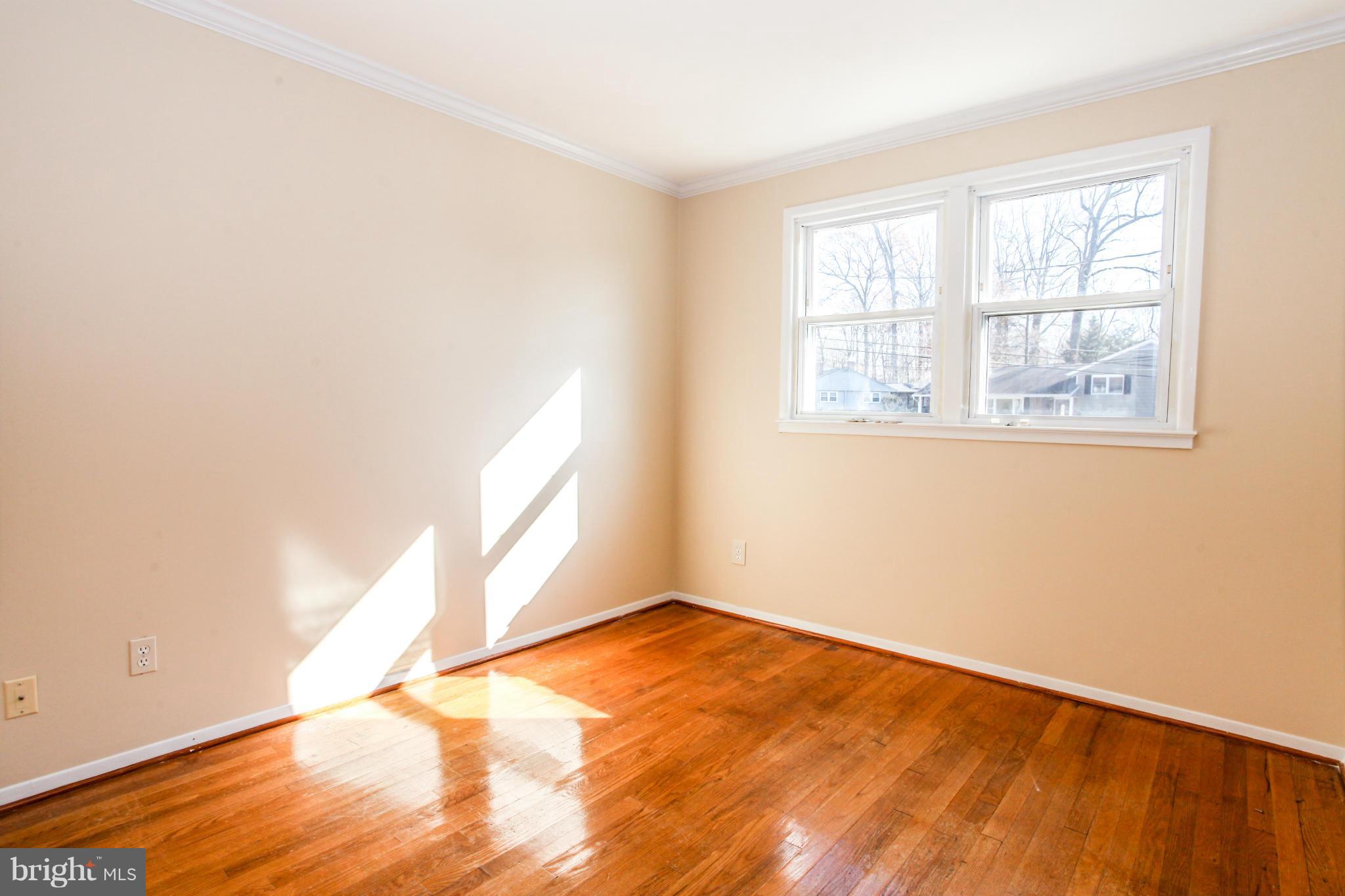 7620 Dunston Street Springfield, VA 22151 - Photo 14 of 24 an empty room with a window