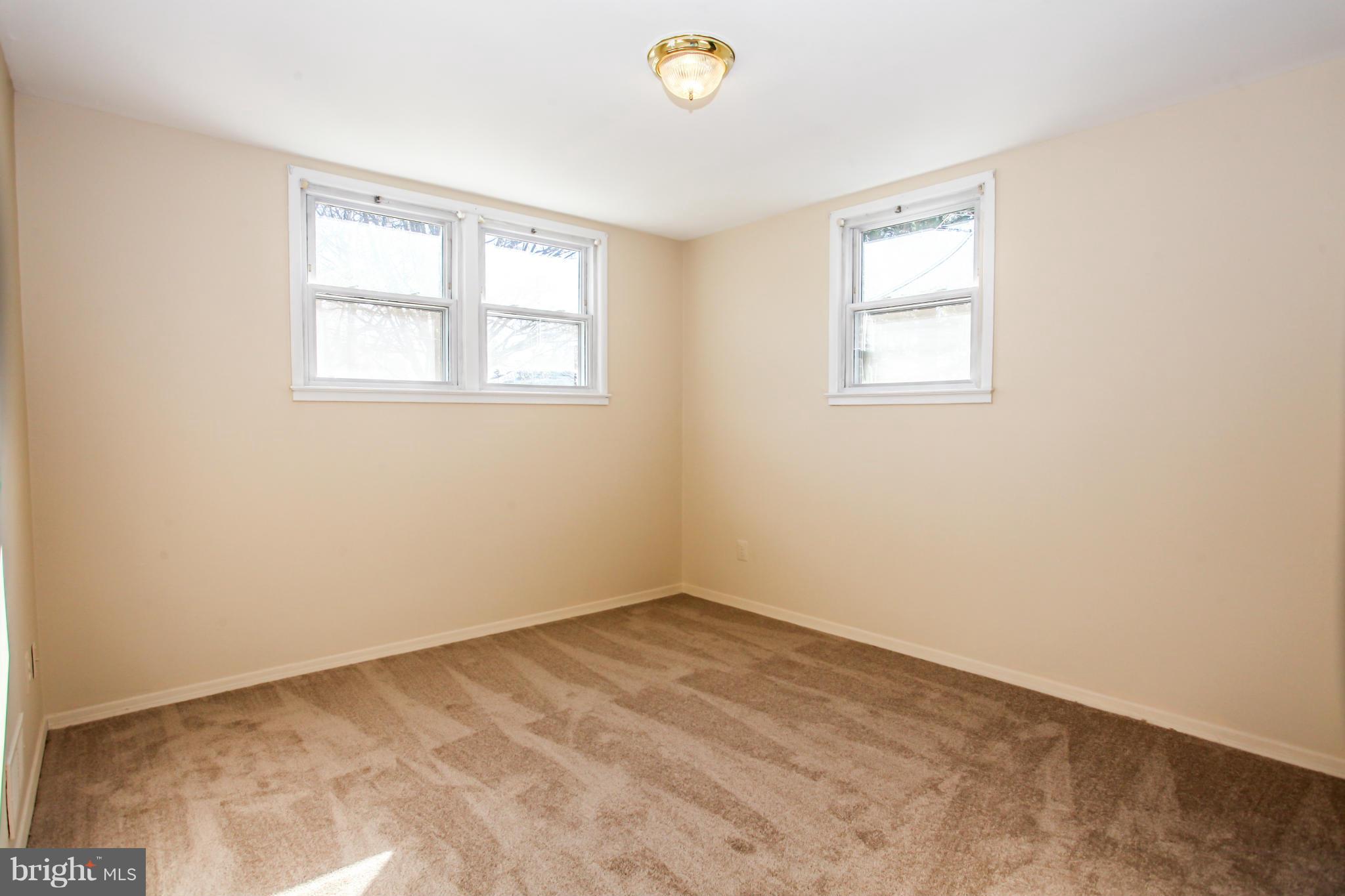 7620 Dunston Street Springfield, VA 22151 - Photo 17 of 24 an empty room with a window