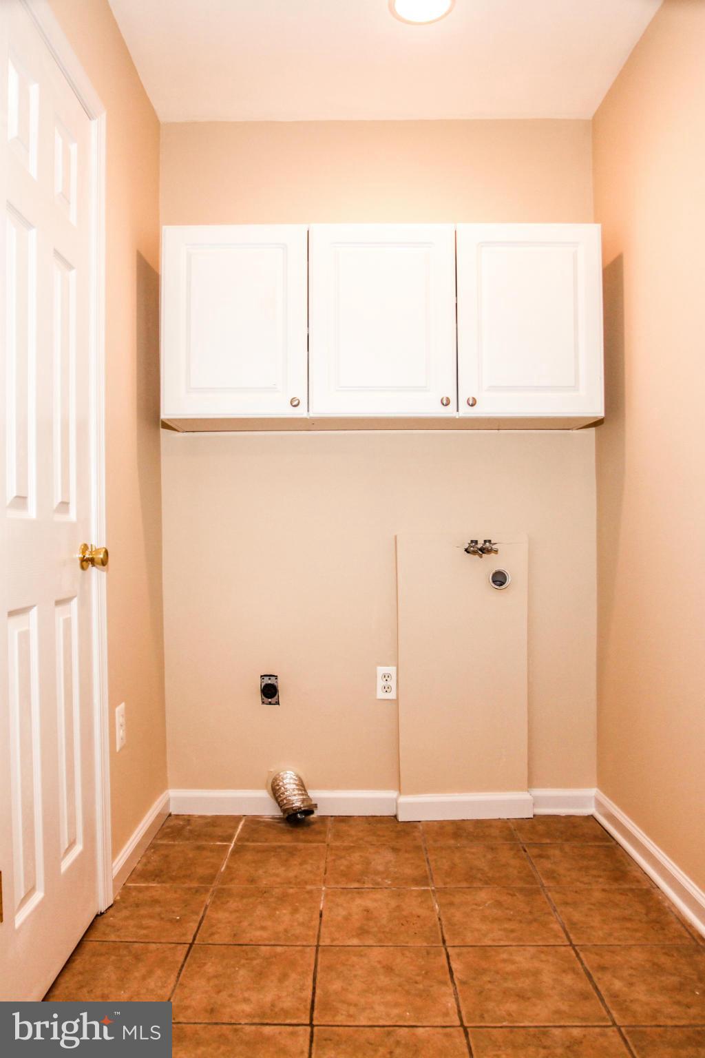 7620 Dunston Street Springfield, VA 22151 - Photo 20 of 24 a view of a room with a window