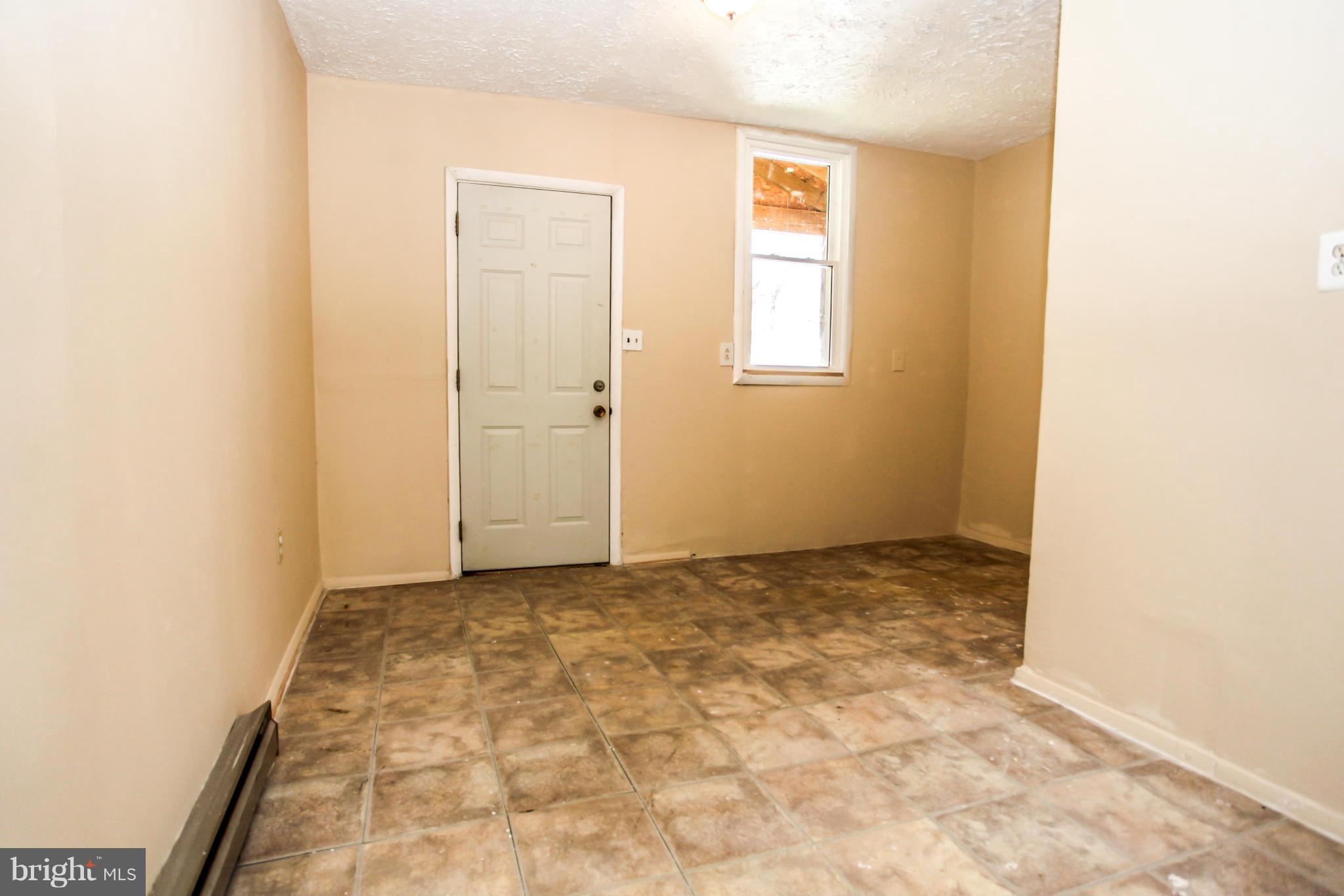 7620 Dunston Street Springfield, VA 22151 - Photo 21 of 24 a view of an empty room and window