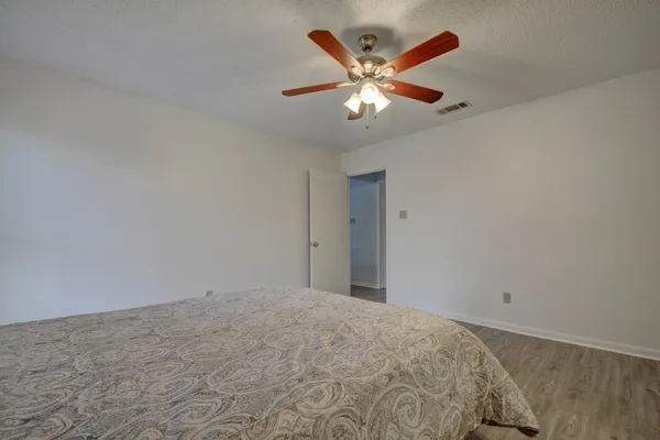 a view of a big room with wooden floor