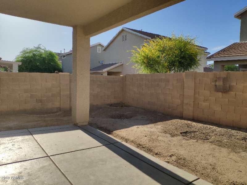4006 West Carter Road Phoenix, AZ 85041 - Photo 11 of 12 a view of a backyard