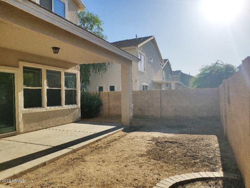 4006 West Carter Road Phoenix, AZ 85041 - Photo 12 of 12 a front view of a house