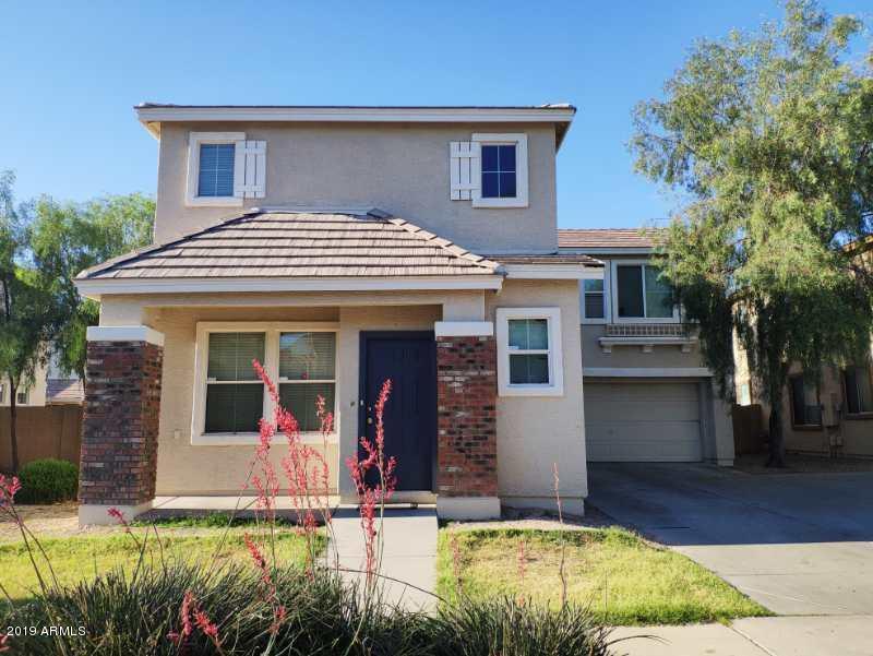 4006 West Carter Road Phoenix, AZ 85041 - Photo 2 of 12 front view of a house with a yard