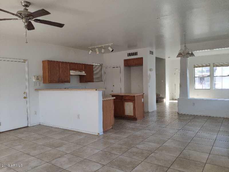 4006 West Carter Road Phoenix, AZ 85041 - Photo 5 of 12 a view of a storage & utility room