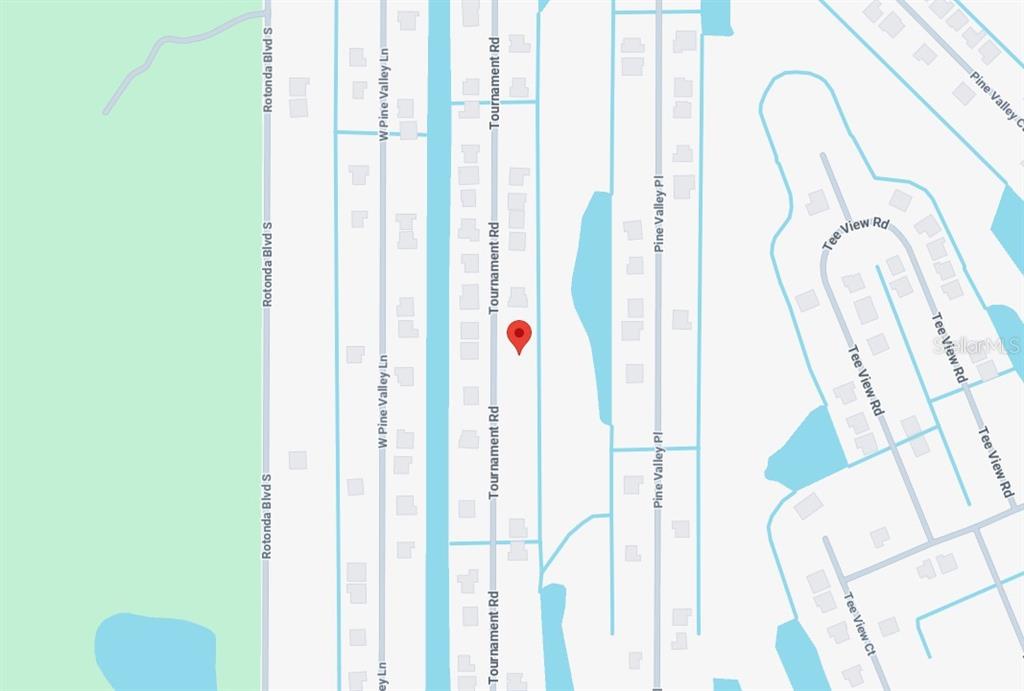 212 Tournament Road Rotonda West, FL 33947 - Photo 5 of 6 a view of a city from a corridor