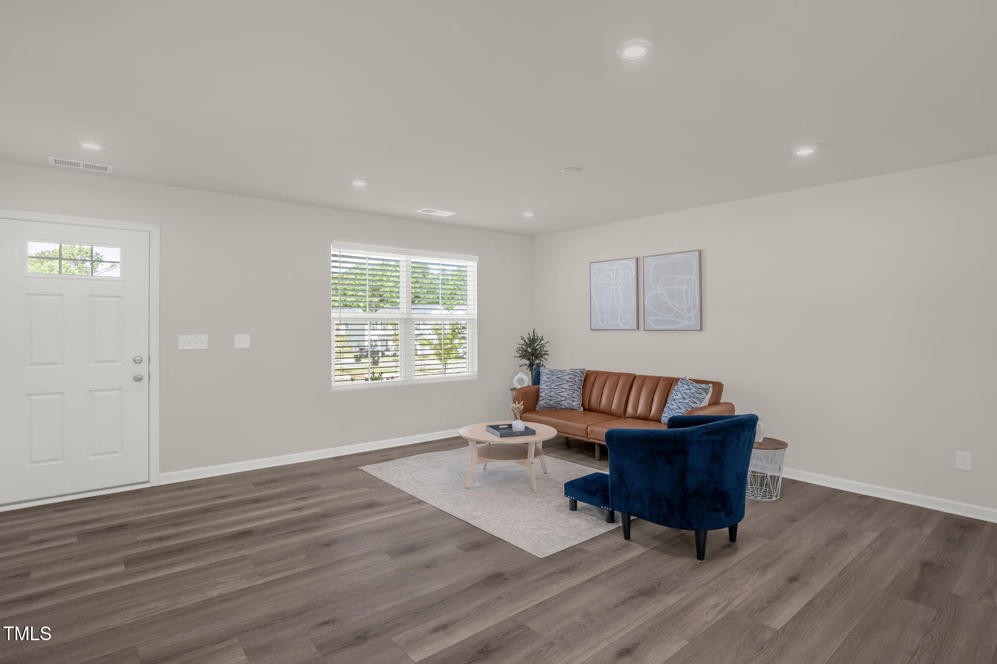 801 Brook Bawn Road Wendell, NC 27591 - Photo 9 of 30 a living room with furniture and a window