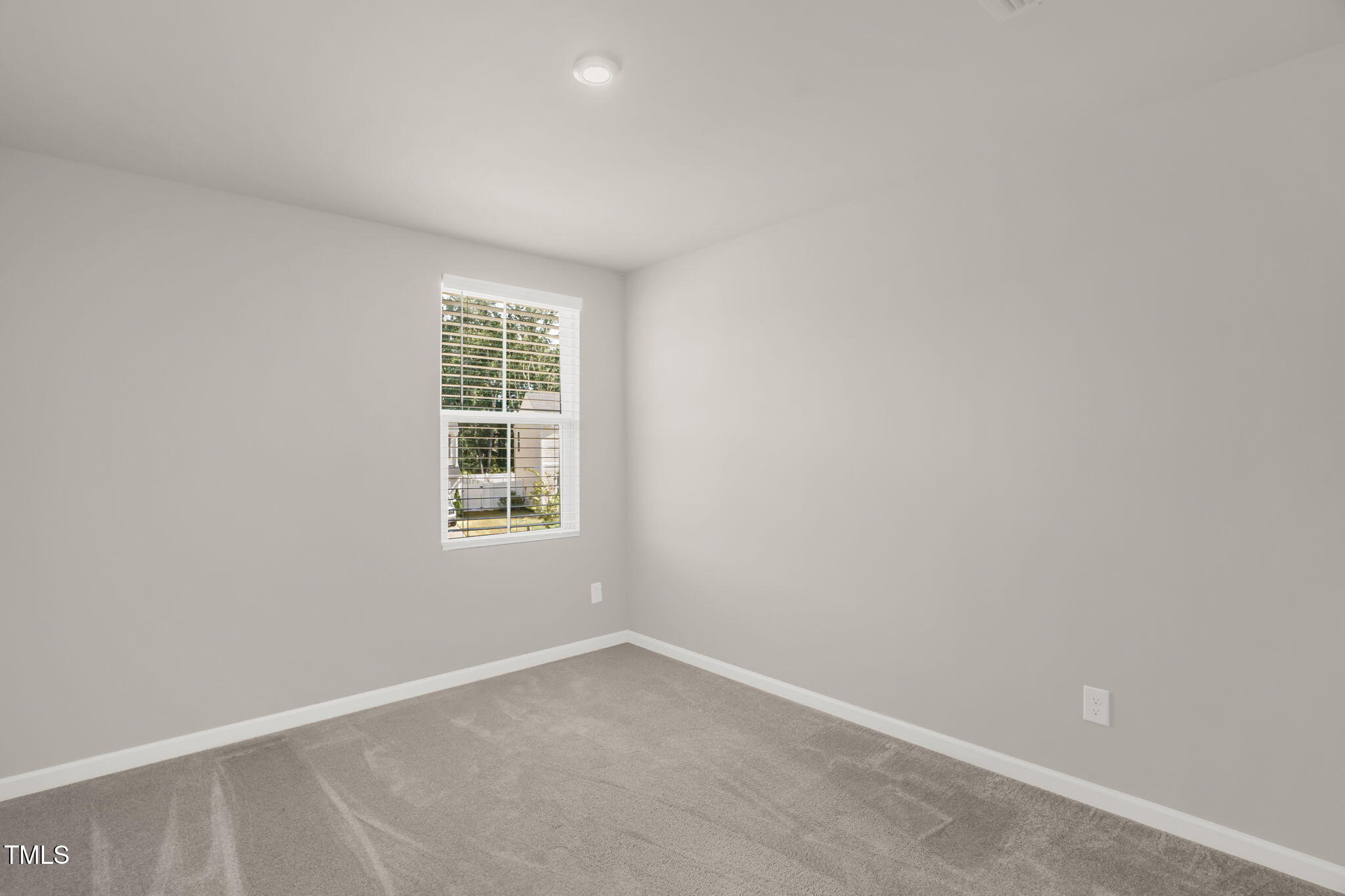 801 Brook Bawn Road Wendell, NC 27591 - Photo 22 of 30 an empty room with a window