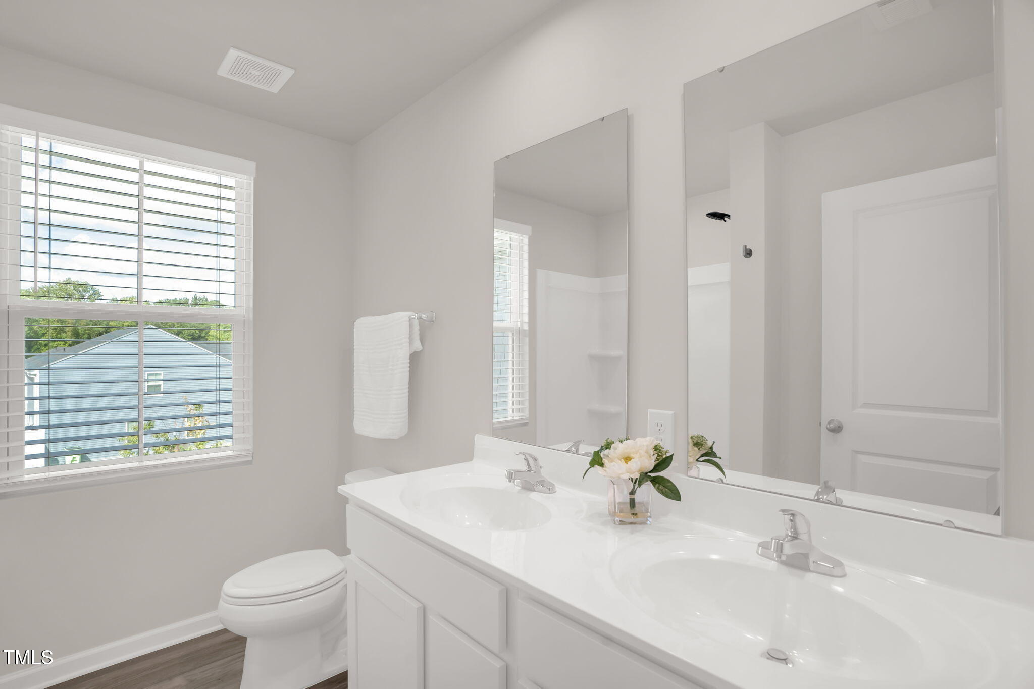 801 Brook Bawn Road Wendell, NC 27591 - Photo 24 of 30 a bathroom with a sink toilet and a mirror