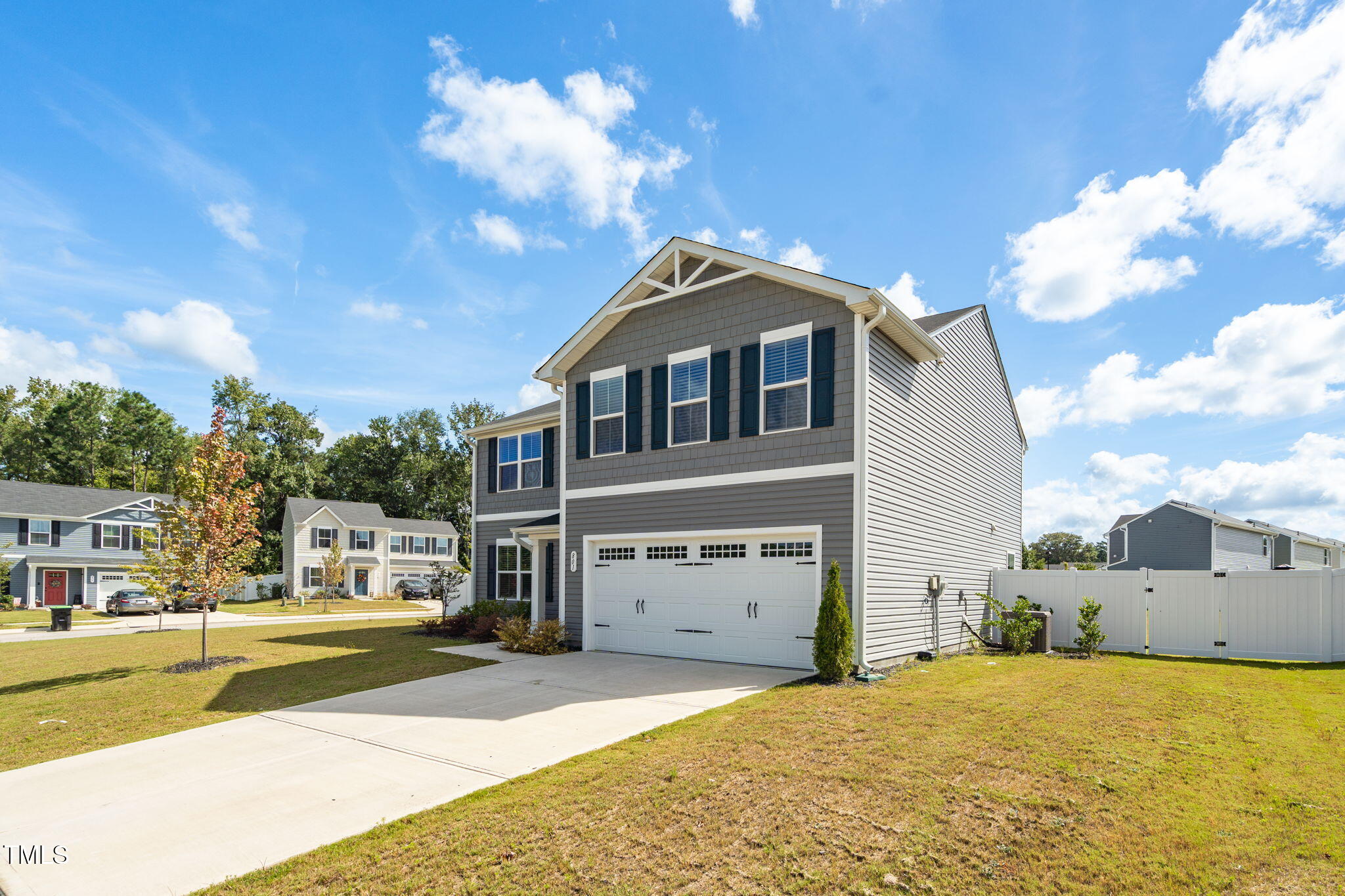 801 Brook Bawn Road Wendell, NC 27591 - Photo 3 of 30 a front view of a house with a yard